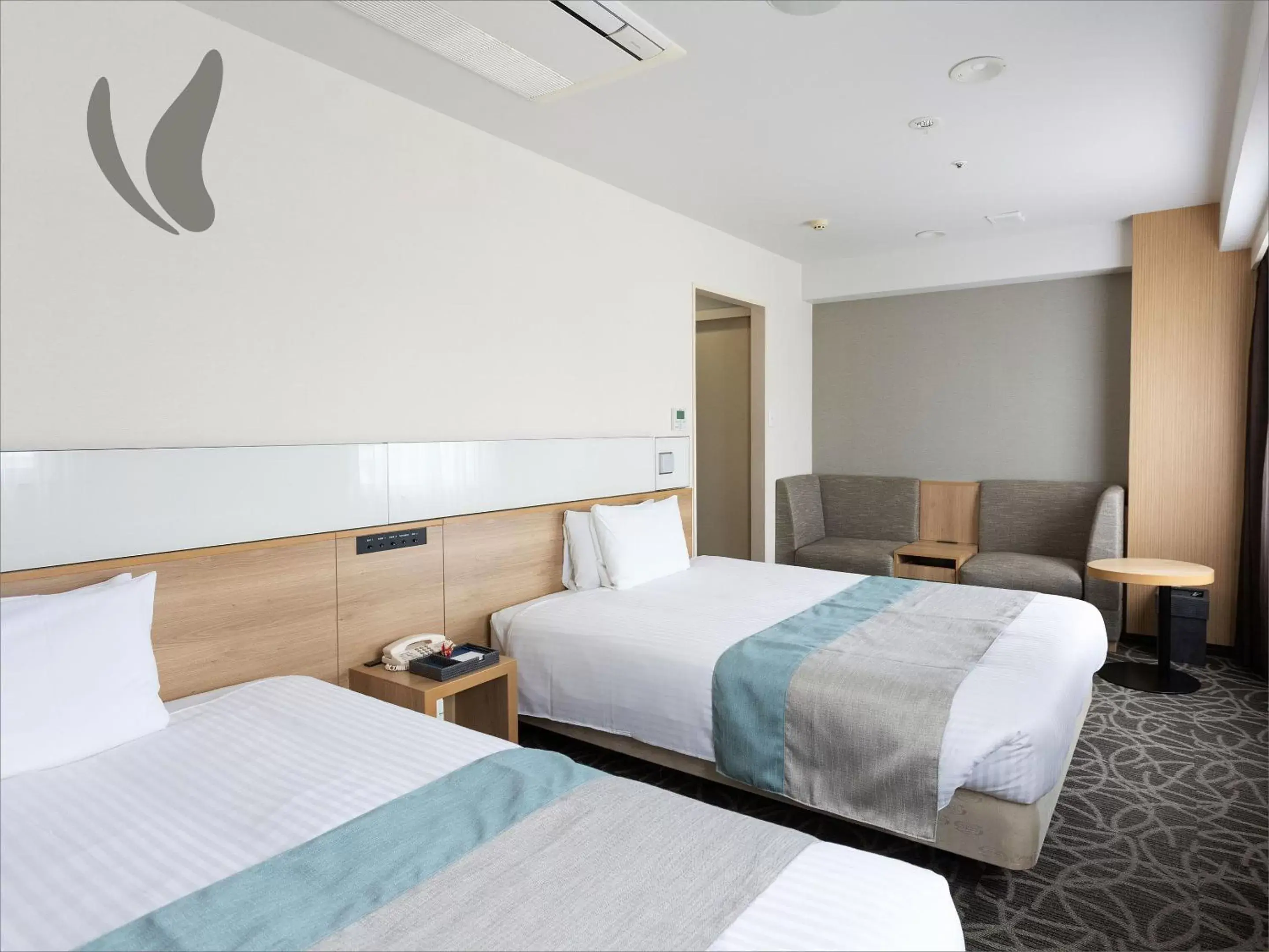 Bedroom, Bed in Hotel Hokke Club Naha Shintoshin