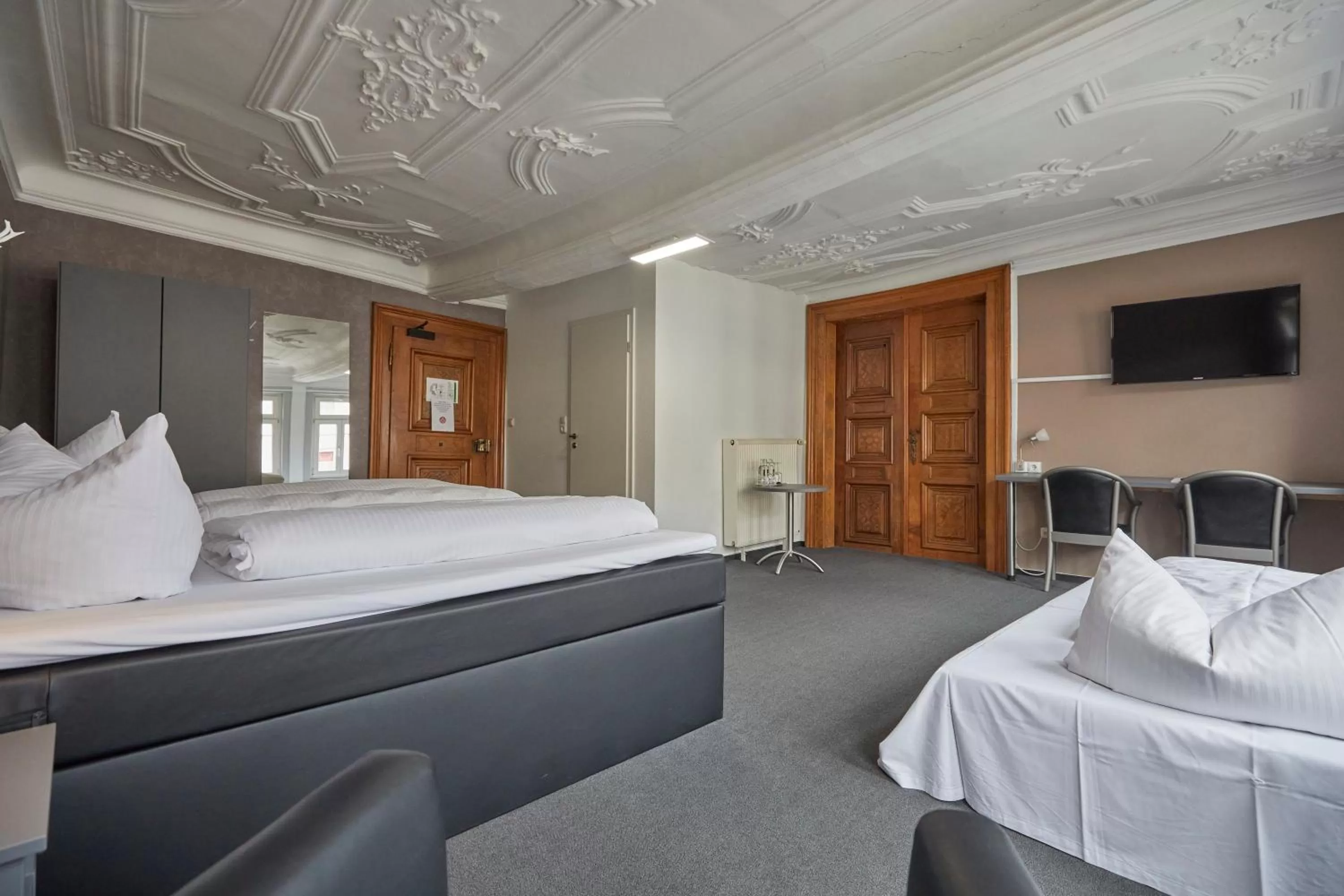 Photo of the whole room, Bed in Hotel Schlemmer Das familäre Altstadt - Hotel mit Herz