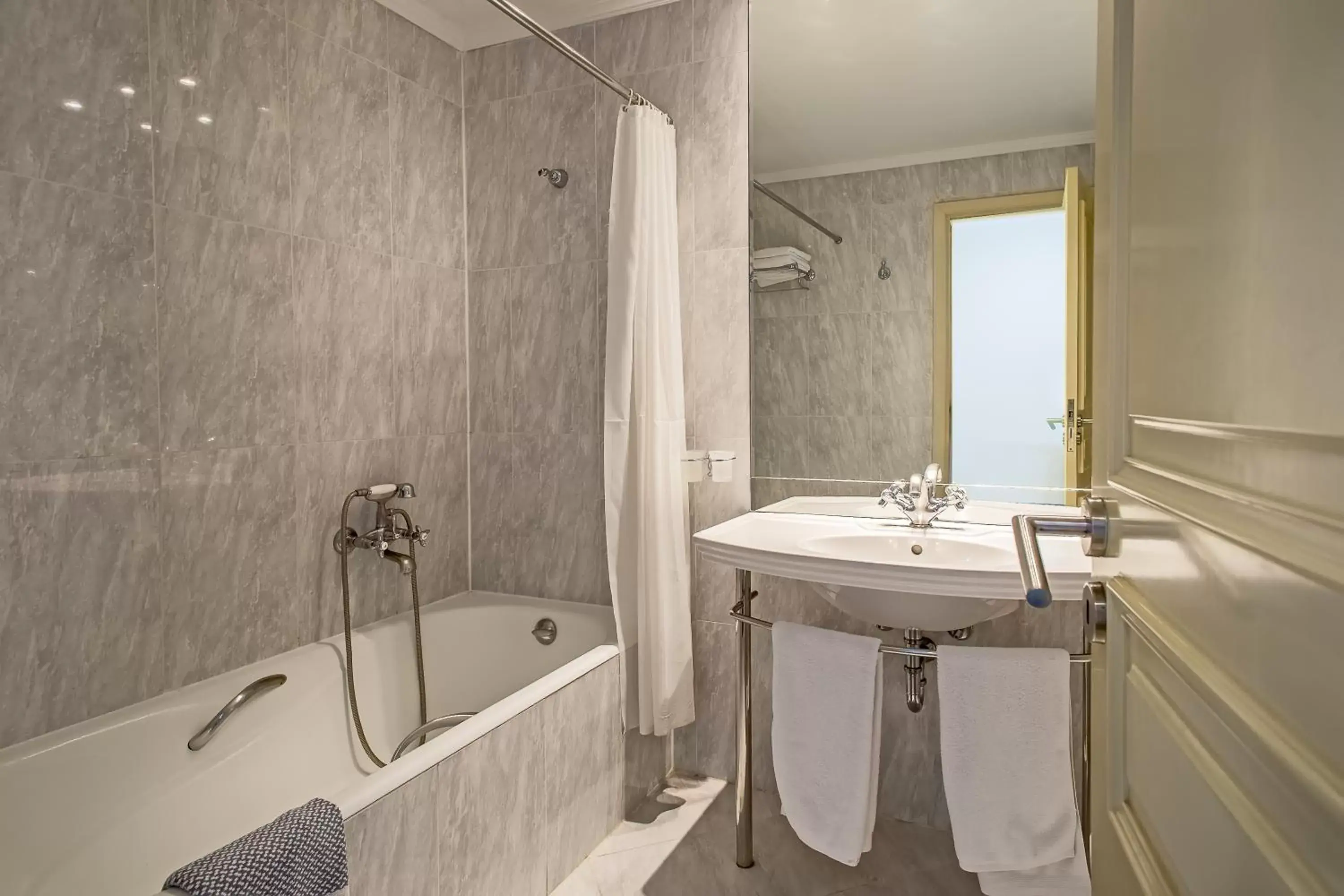 Bathroom in Airotel Stratos Vassilikos Hotel