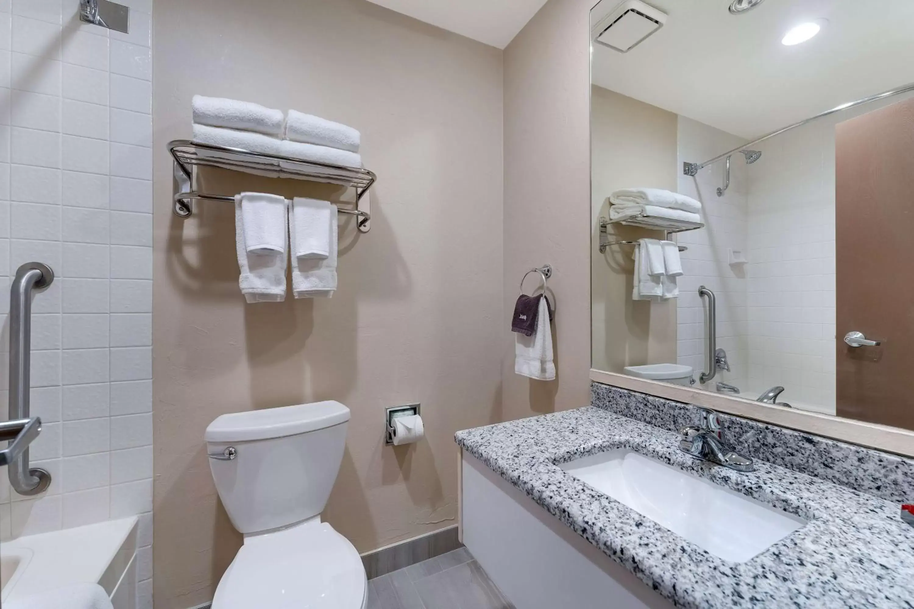 Bathroom in SureStay Plus Hotel by Best Western Price