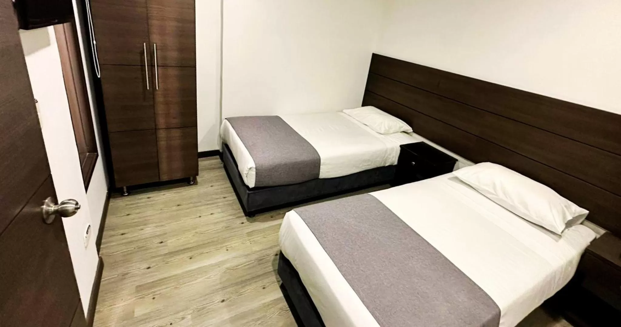 Bed in Hotel Expo Hotel Ferial