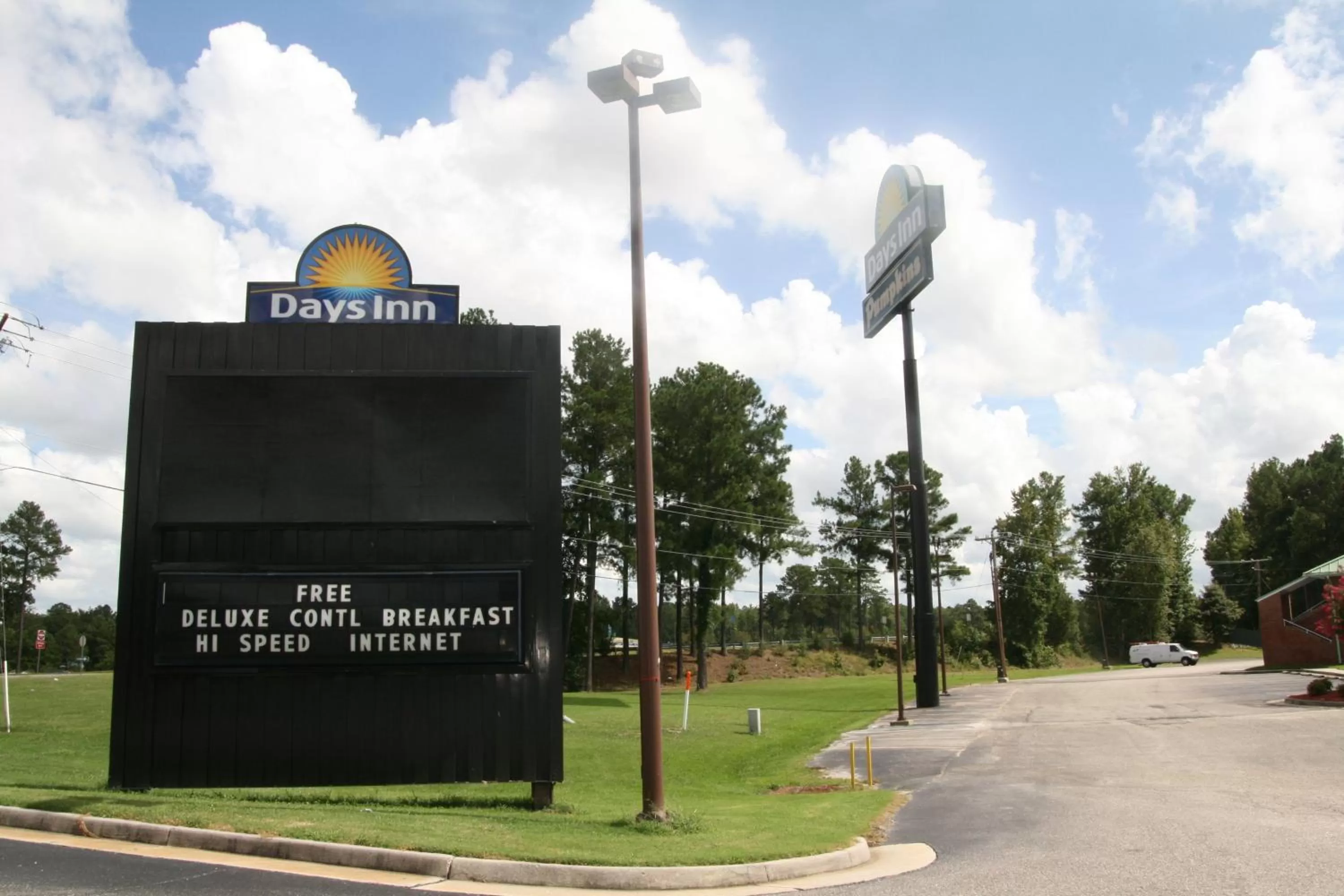 Property logo or sign in Days Inn by Wyndham Petersburg/South Fort Lee