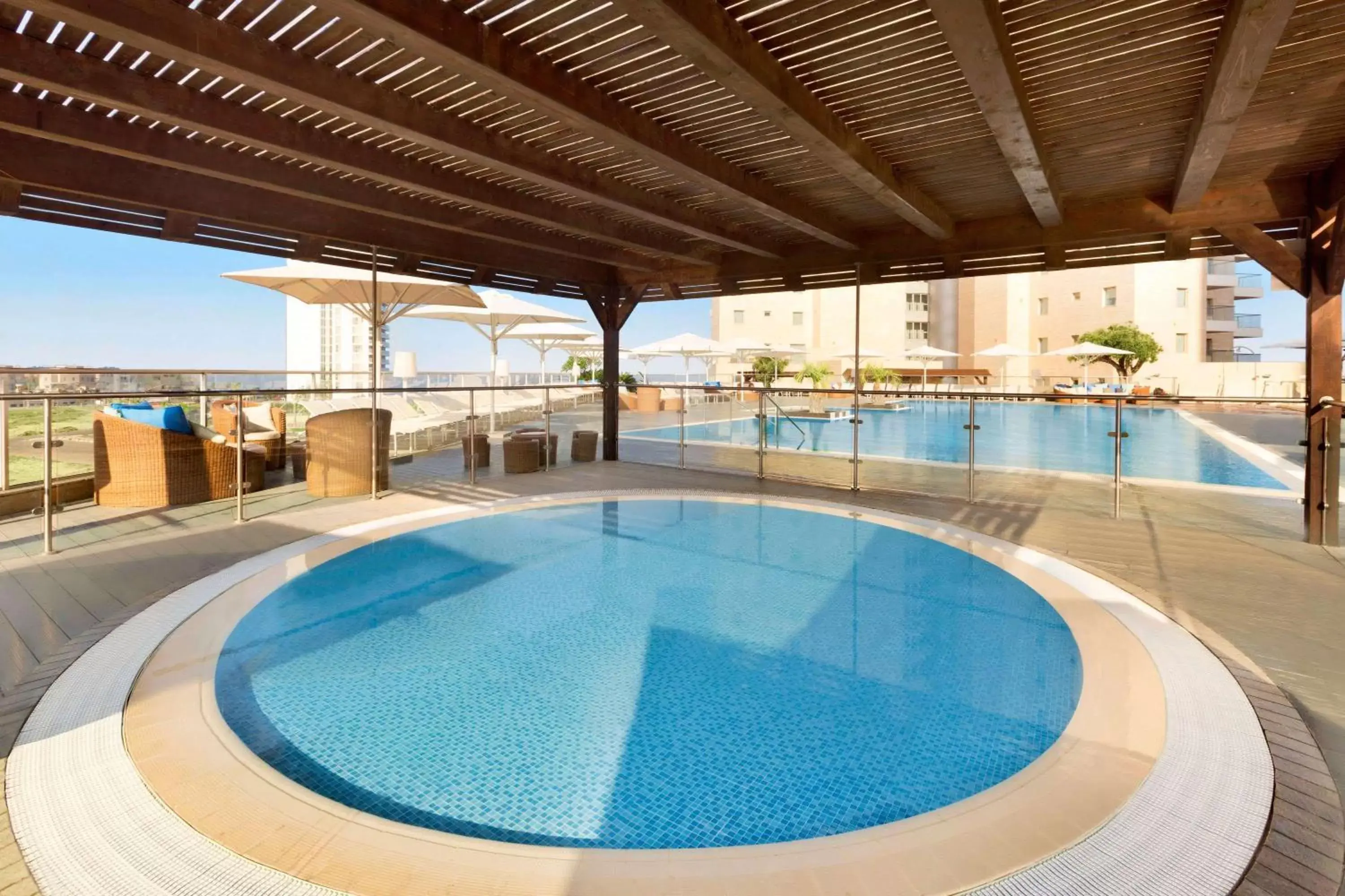 On site, Swimming Pool in Ramada Hotel & Suites by Wyndham Netanya