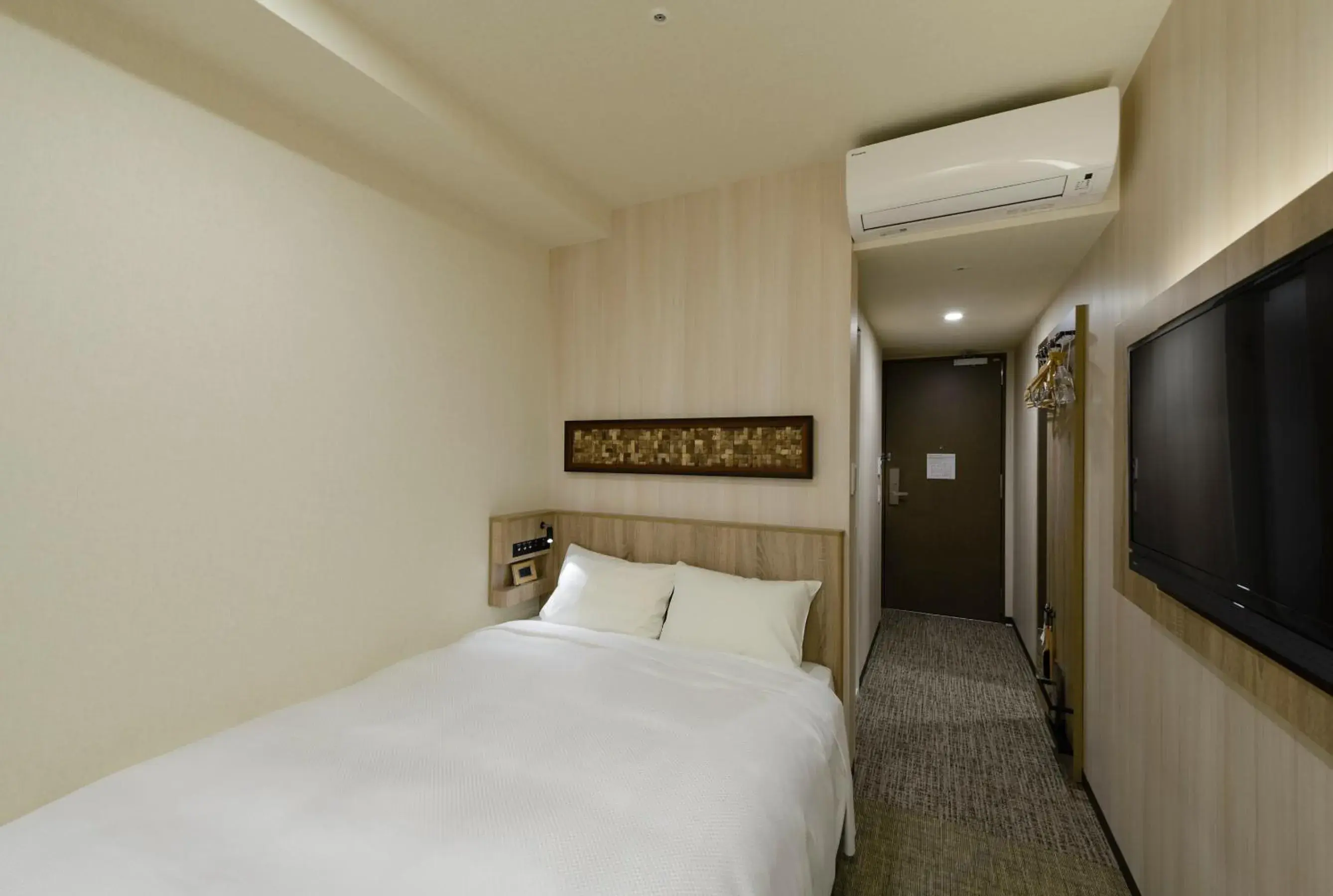 Bed in Hotel Il Fiore Kasai Bed in Hotel Il Fiore Kasai