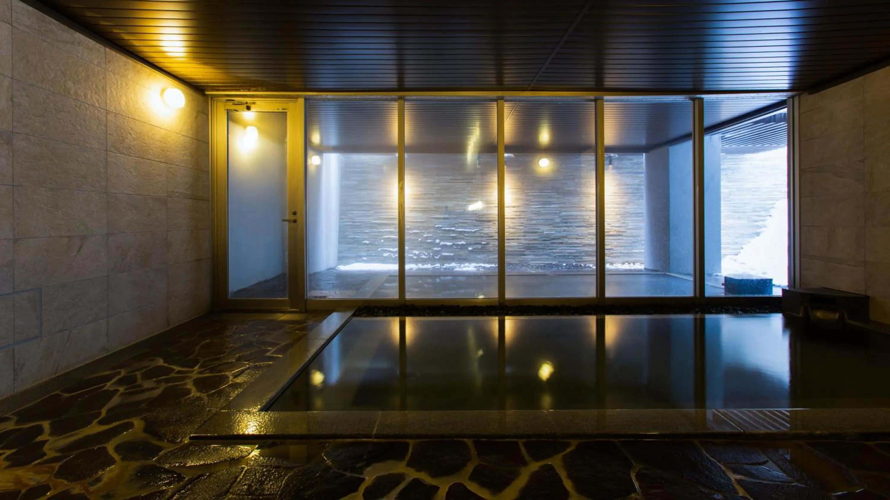 Hot Spring Bath in Chalet Ivy Hirafu, Niseko