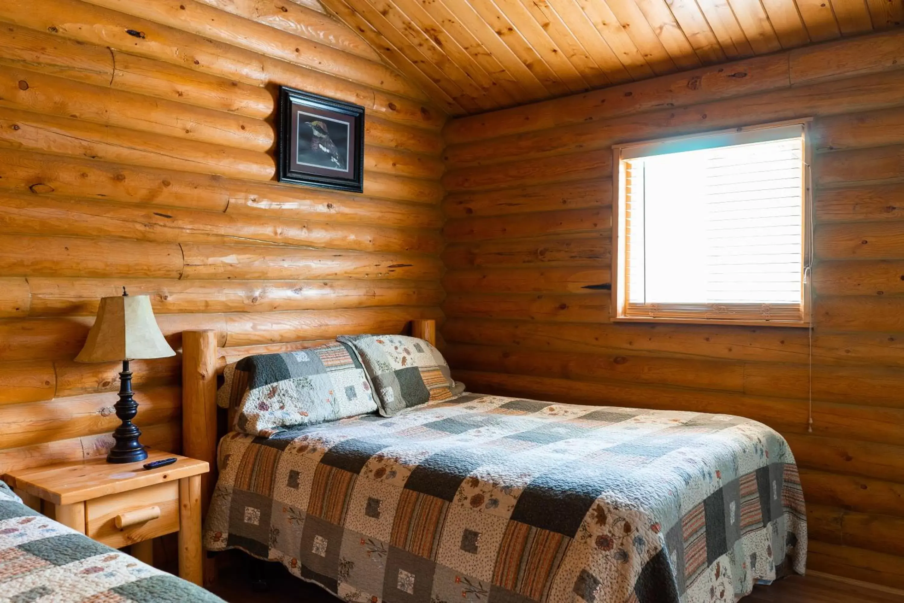 Bed in Country Cabins Inn