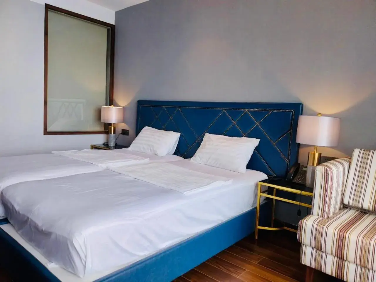 Bed in blue Cam Ranh Nha Trang resort