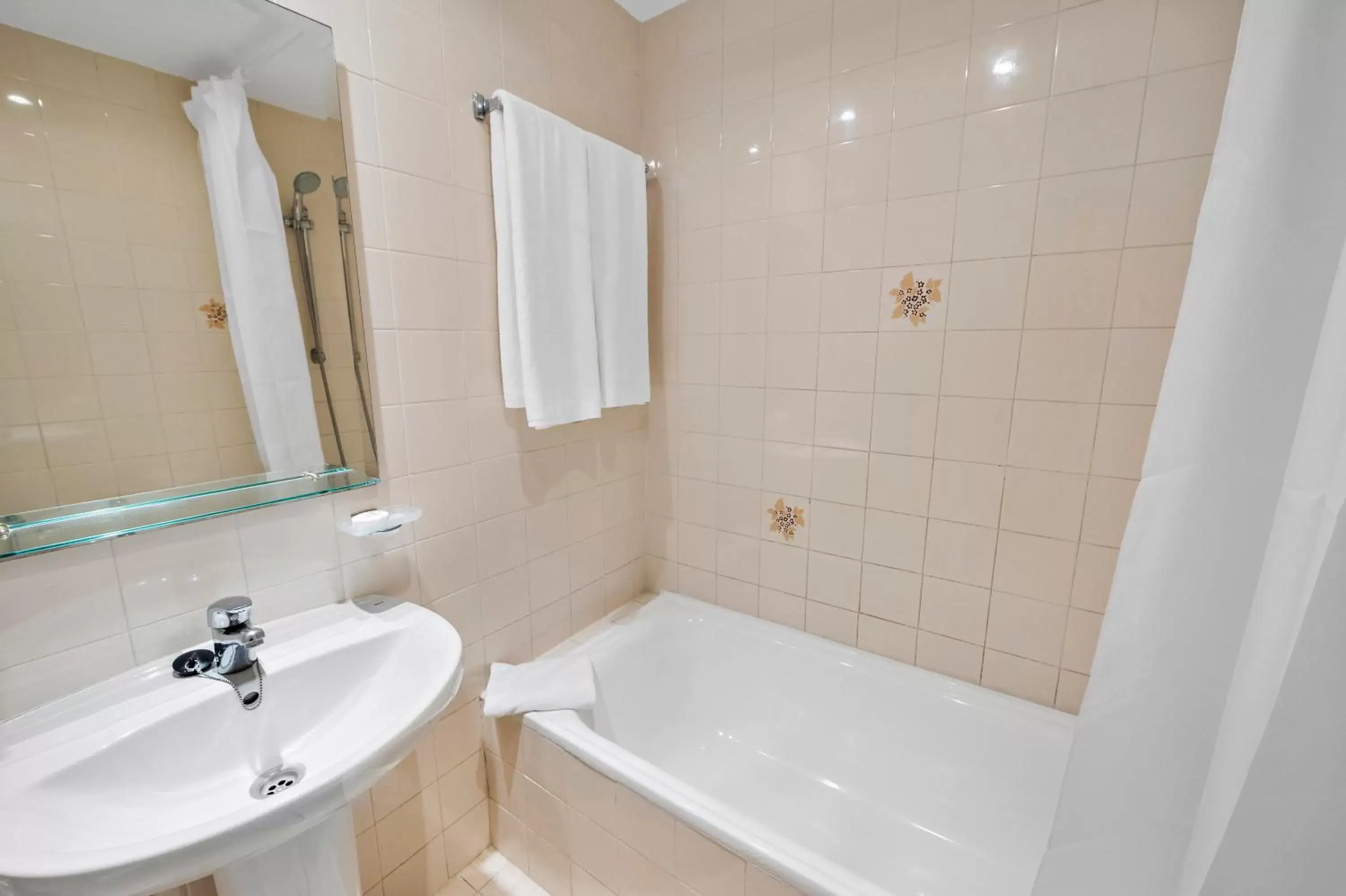 Bathroom in Ramada Hotel & Suites by Wyndham Costa del Sol