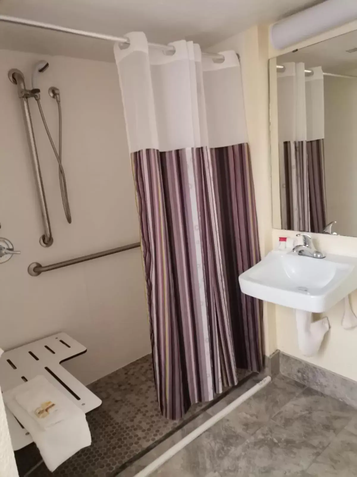 Bathroom in Super 8 by Wyndham San Antonio Near SeaWorld Ingram Park