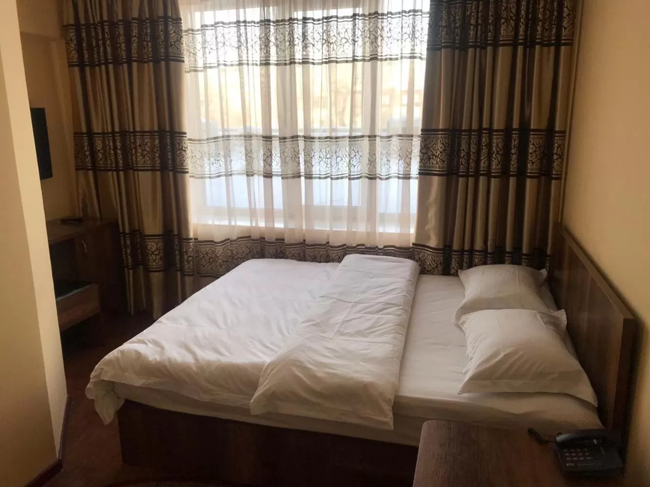 Bed in Altai Business Hotel