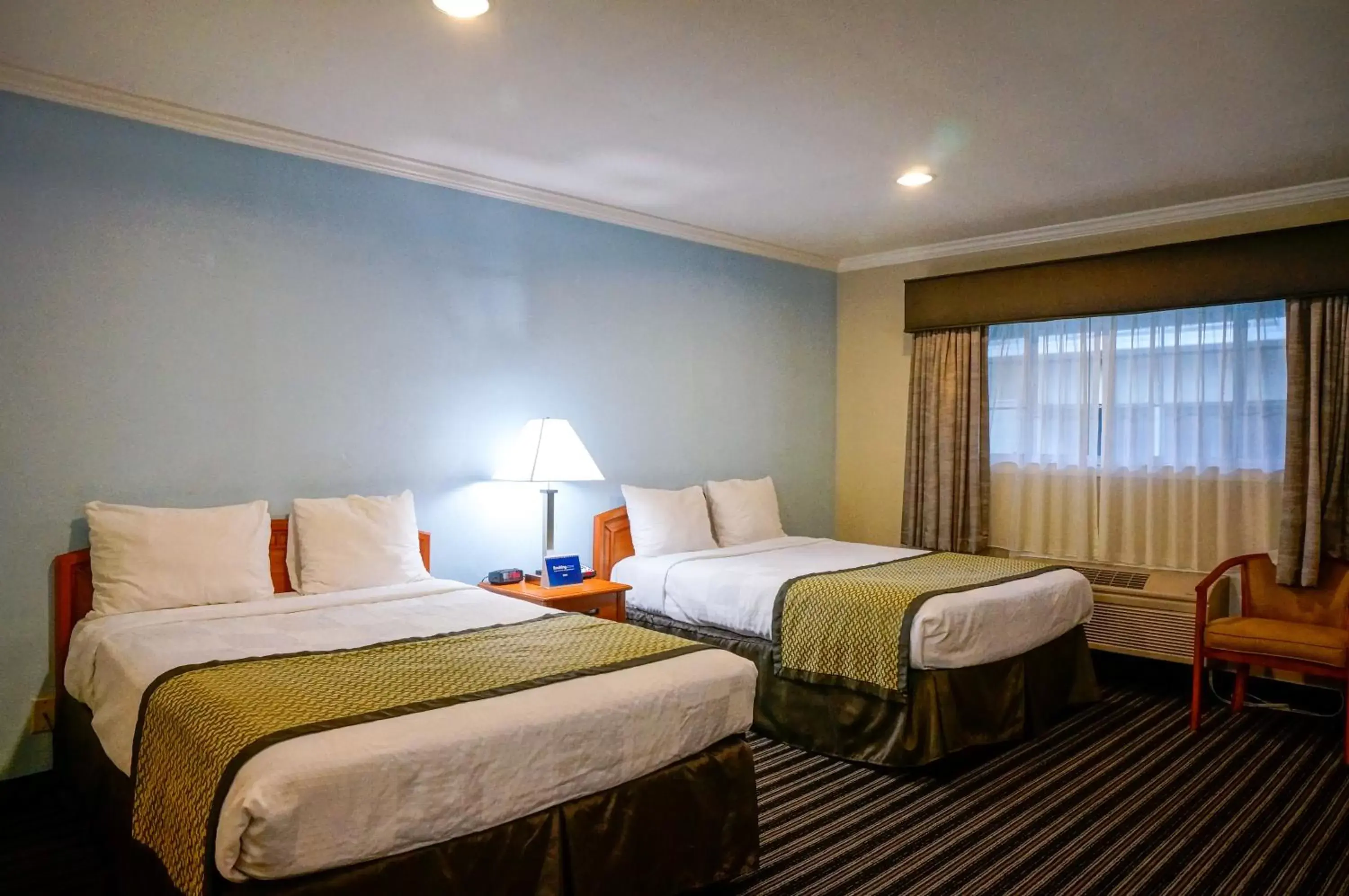 Bedroom, Bed in Hotel Parmani