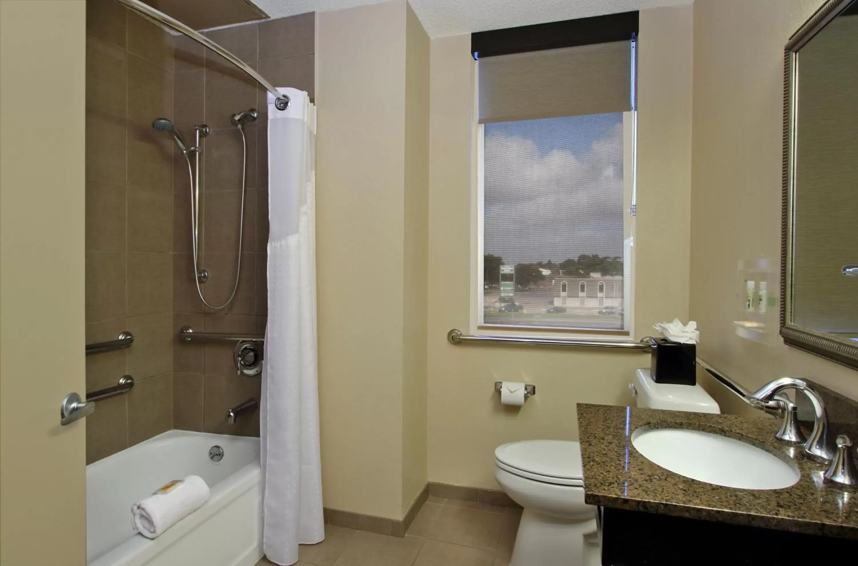 Bathroom in Holiday Inn Metairie New Orleans, an IHG Hotel