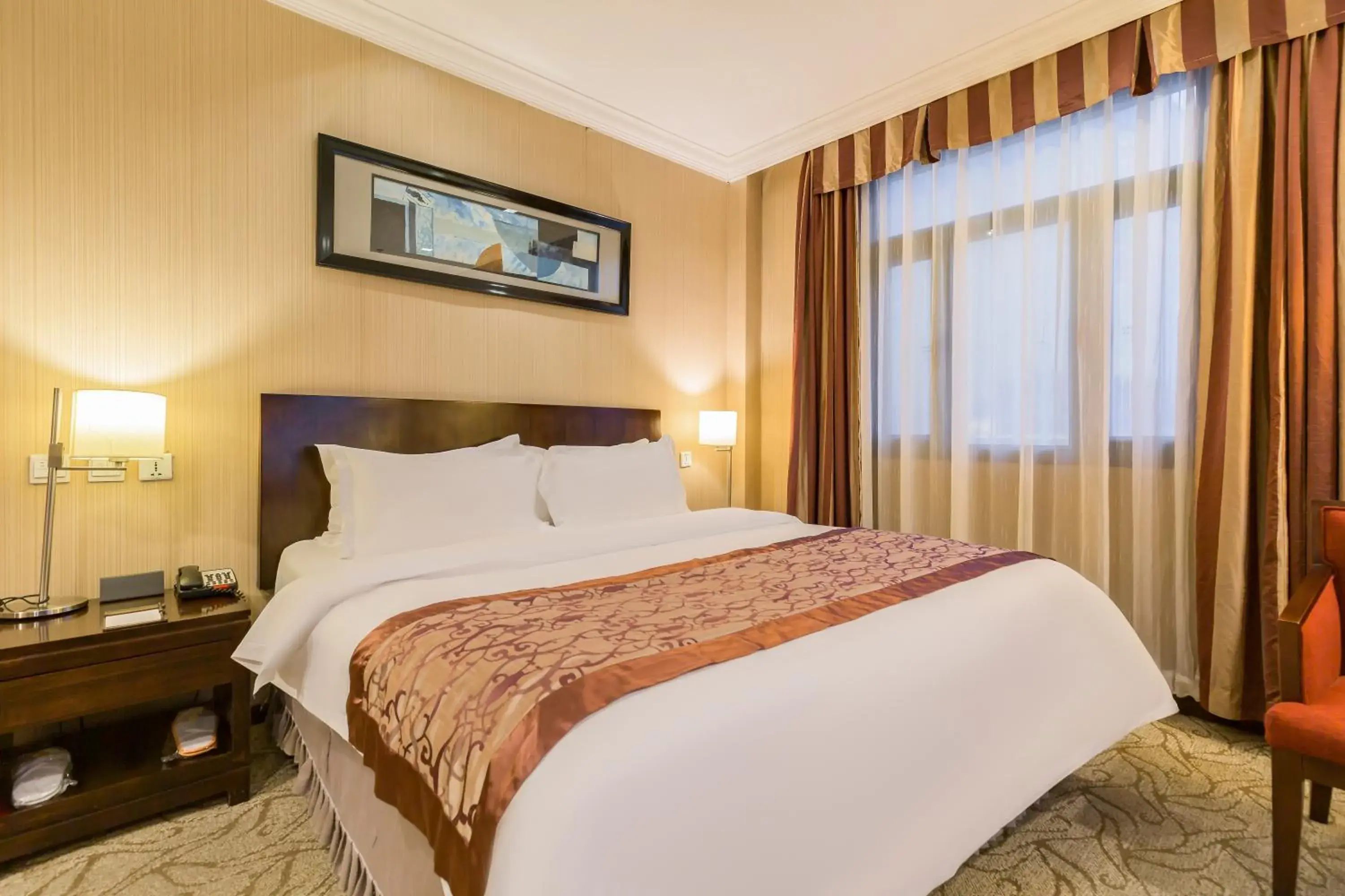 Bed in Jianguo Hotspring Hotel