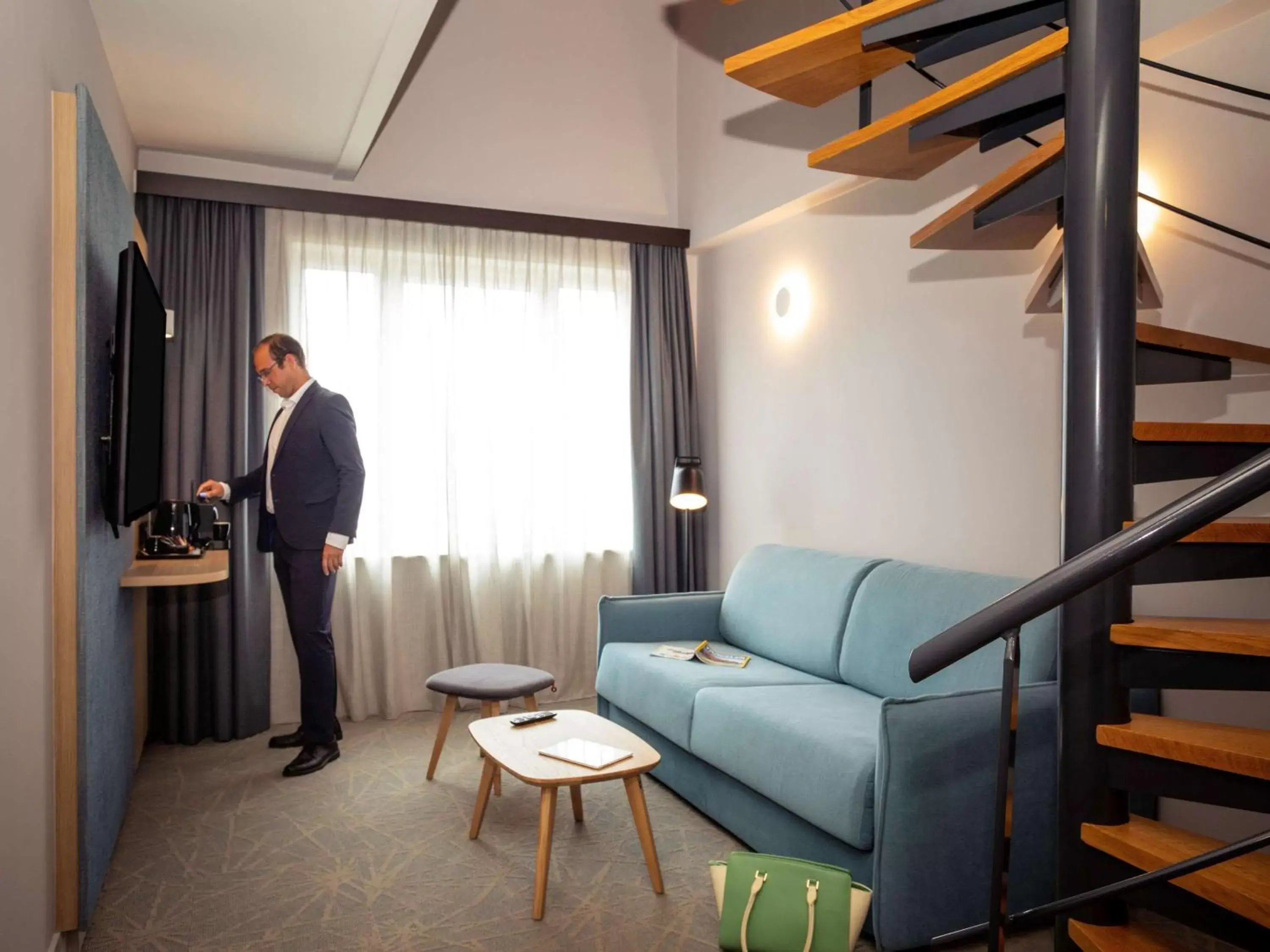 Photo of the whole room, Seating Area in Novotel Brussels Centre Midi