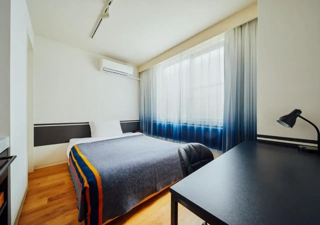 Theater Double Room with Private Shower - single occupancy in Hotel Graphy Nezu Theater Double Room with Private Shower - single occupancy in Hotel Graphy Nezu