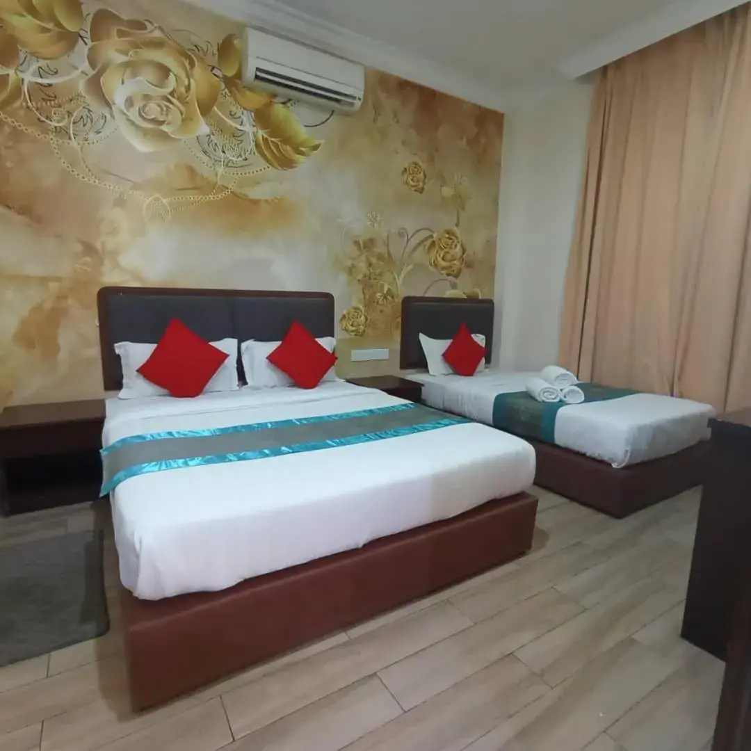 Bed in OYO 750 Comfort Hotel