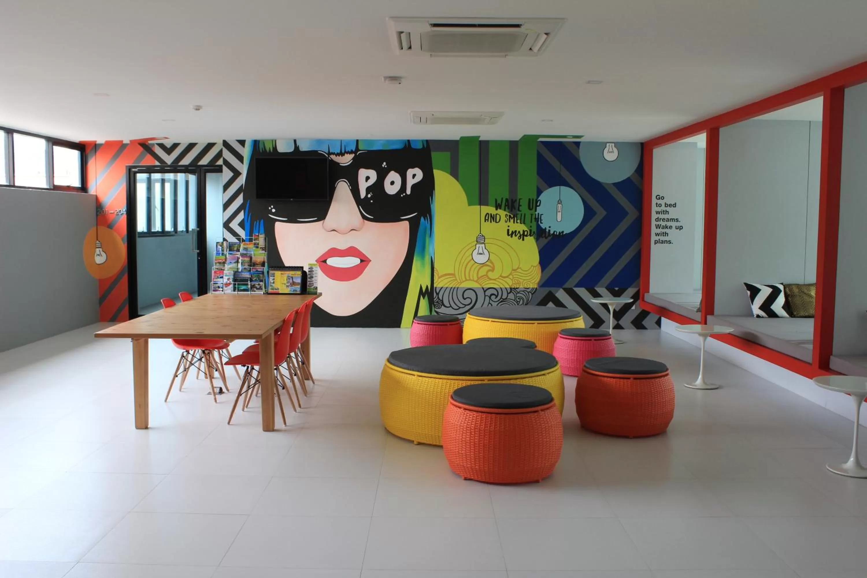 Communal lounge/ TV room in Wake Up Aonang Hotel