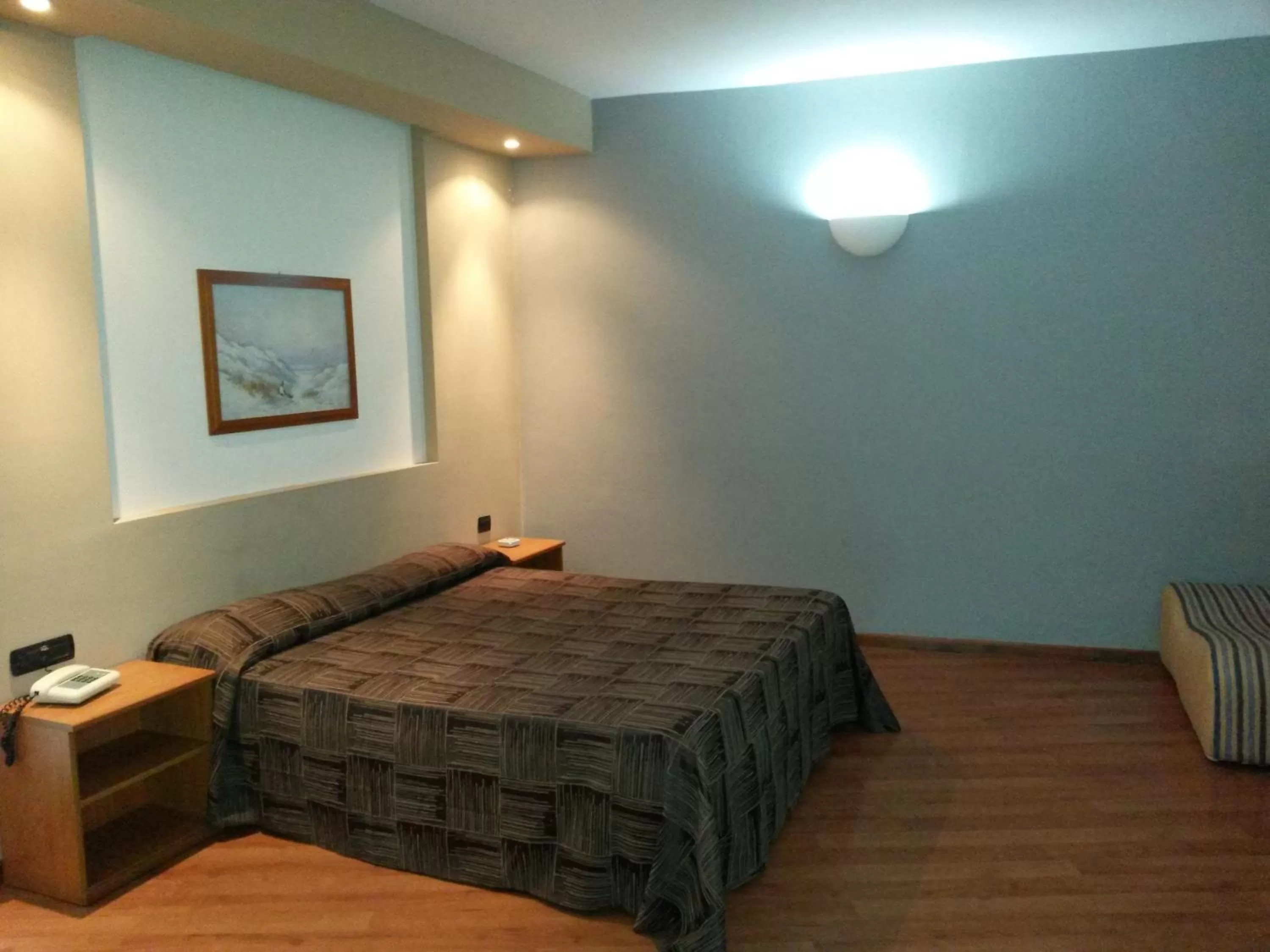 Decorative detail, Bed in Hotel Ginepro