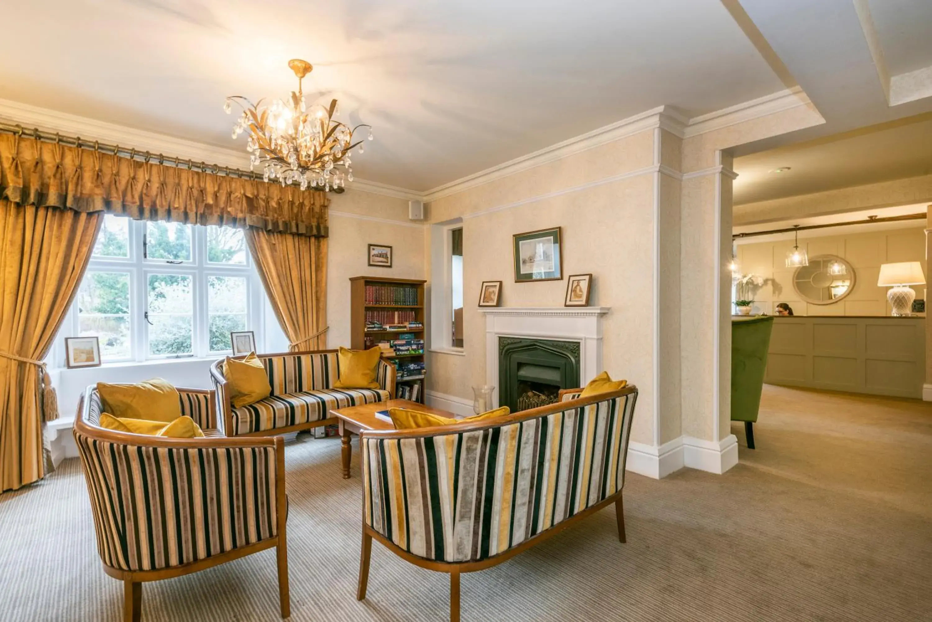 Communal lounge/ TV room, Seating Area in Heacham Manor Hotel