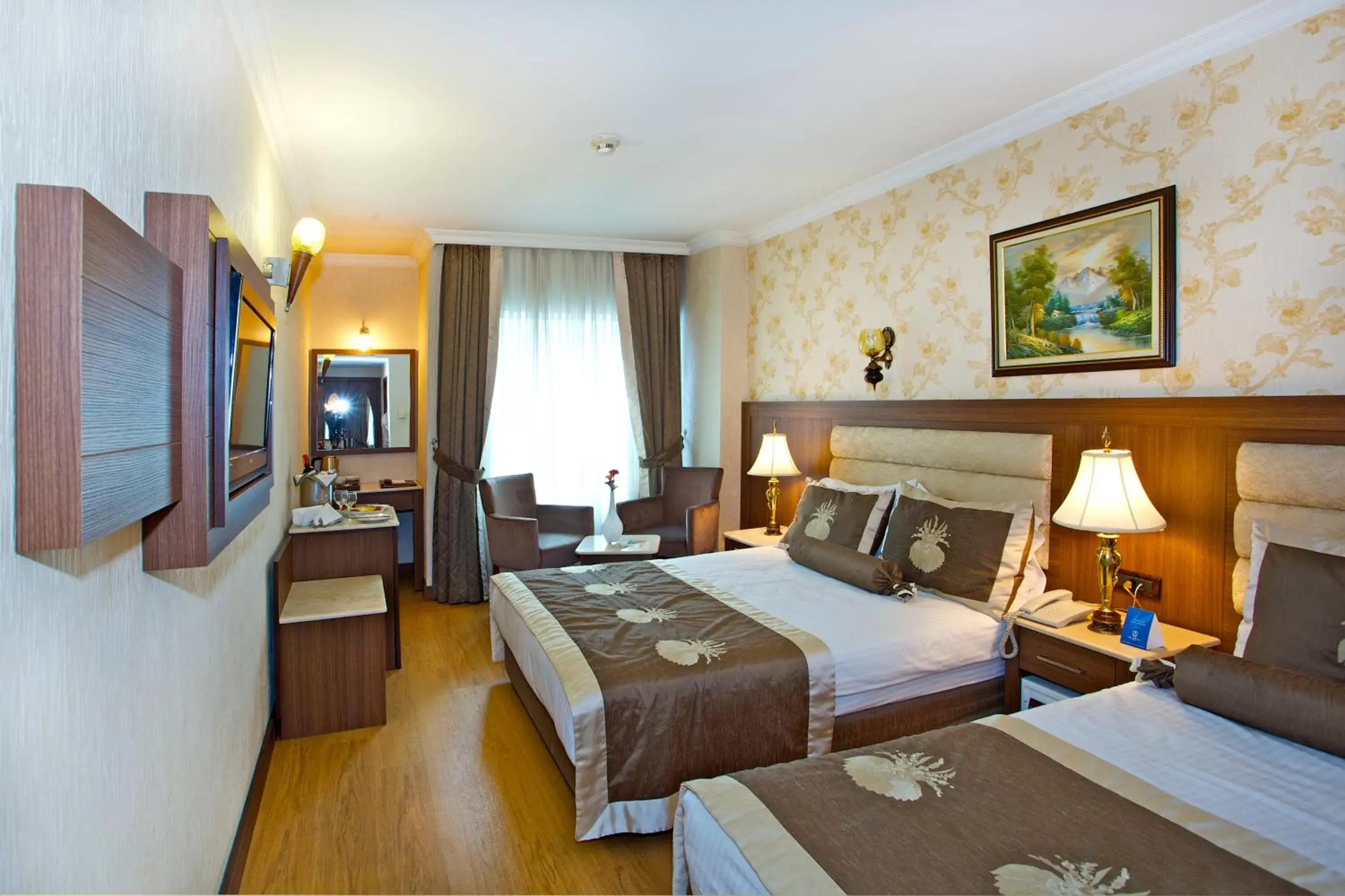Photo of the whole room, Bed in Grand Hilarium Hotel
