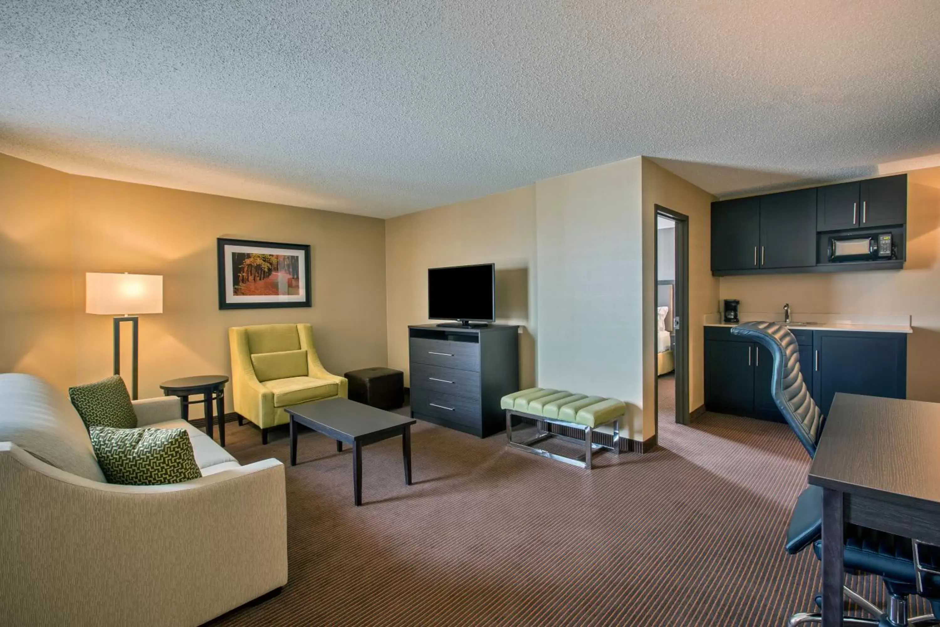 Photo of the whole room, Seating Area in Holiday Inn Express & Suites Regina Downtown, an IHG Hotel