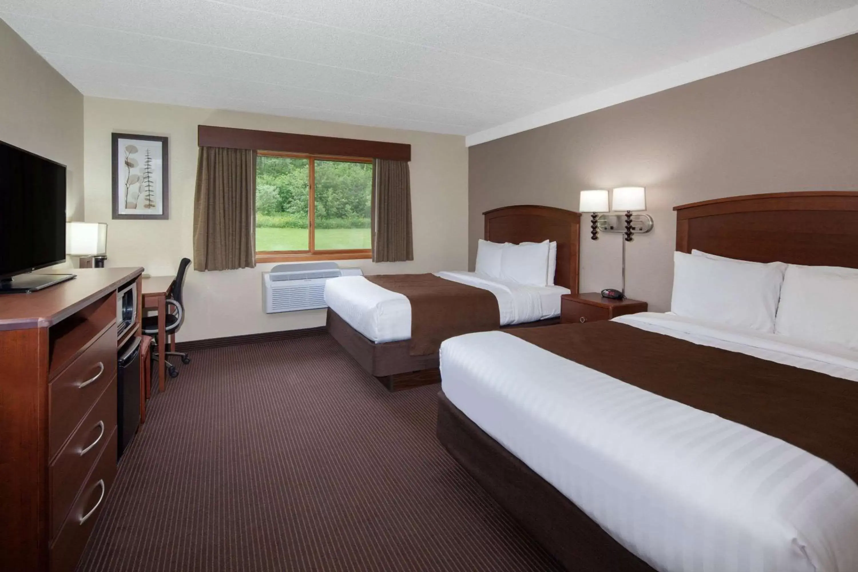 Photo of the whole room, Bed in AmericInn by Wyndham Ironwood