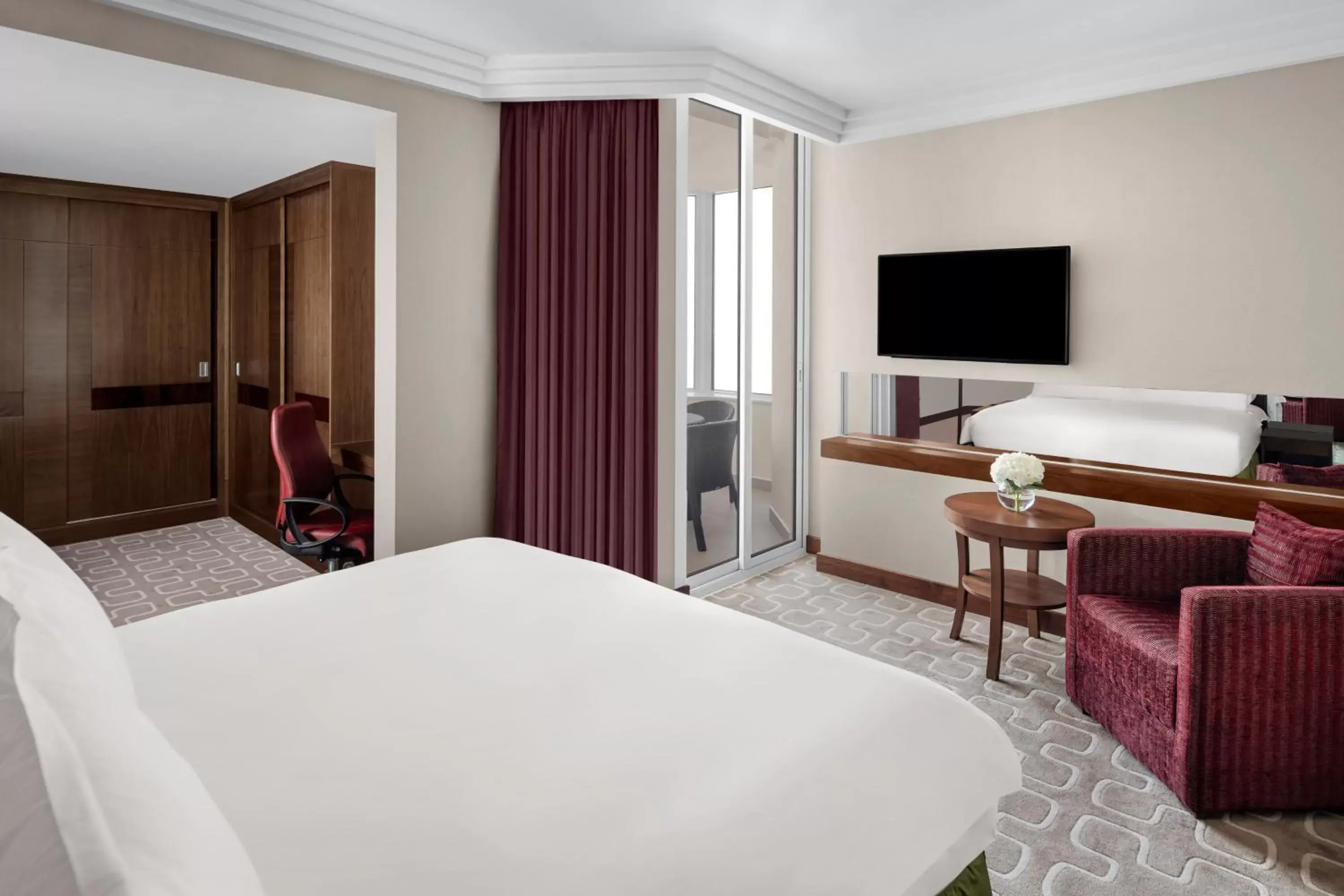 Bedroom, TV/Entertainment Center in Crowne Plaza Hotel Riyadh Minhal, an IHG Hotel