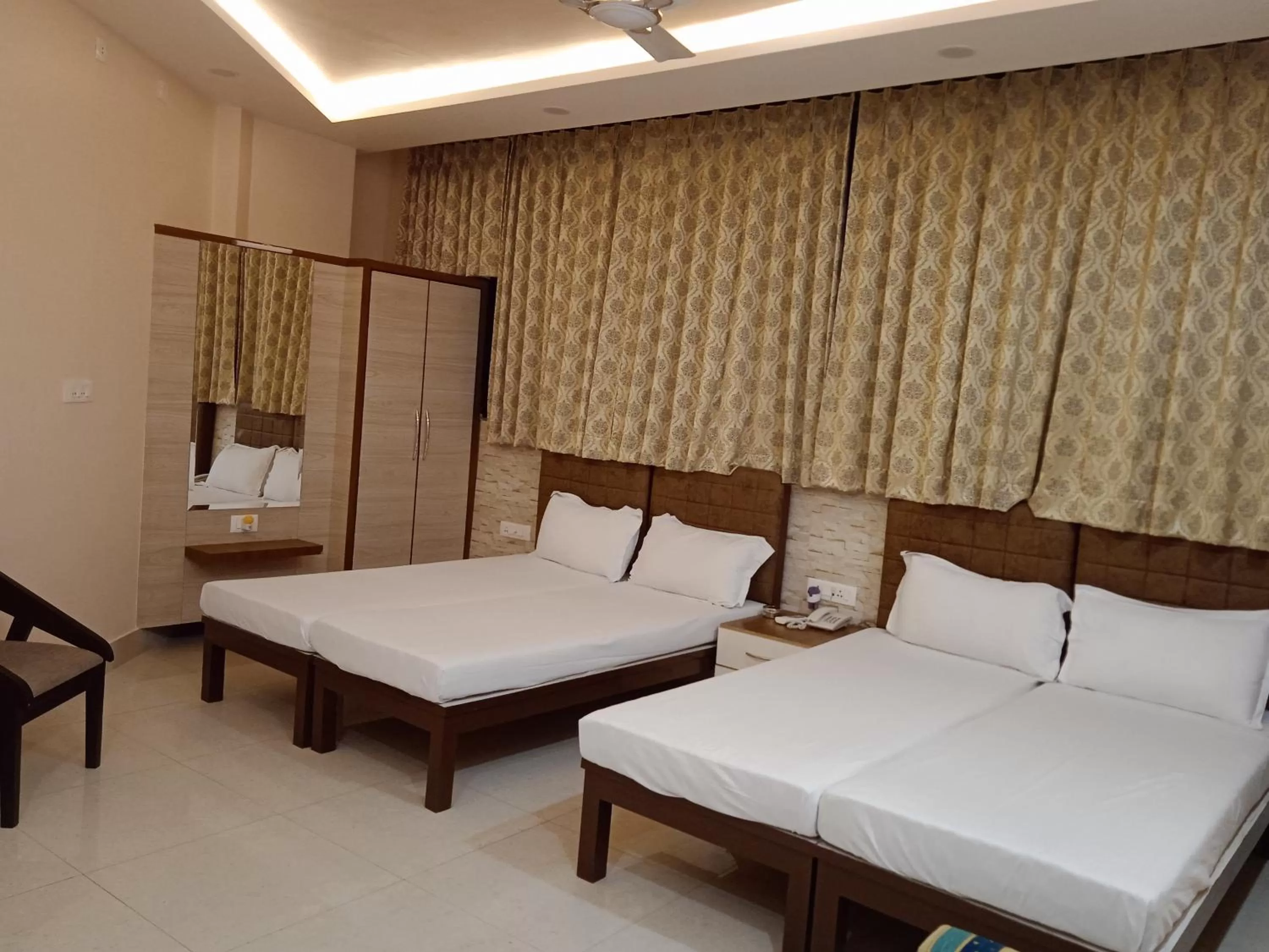 Bed in Hotel Shri Gourav