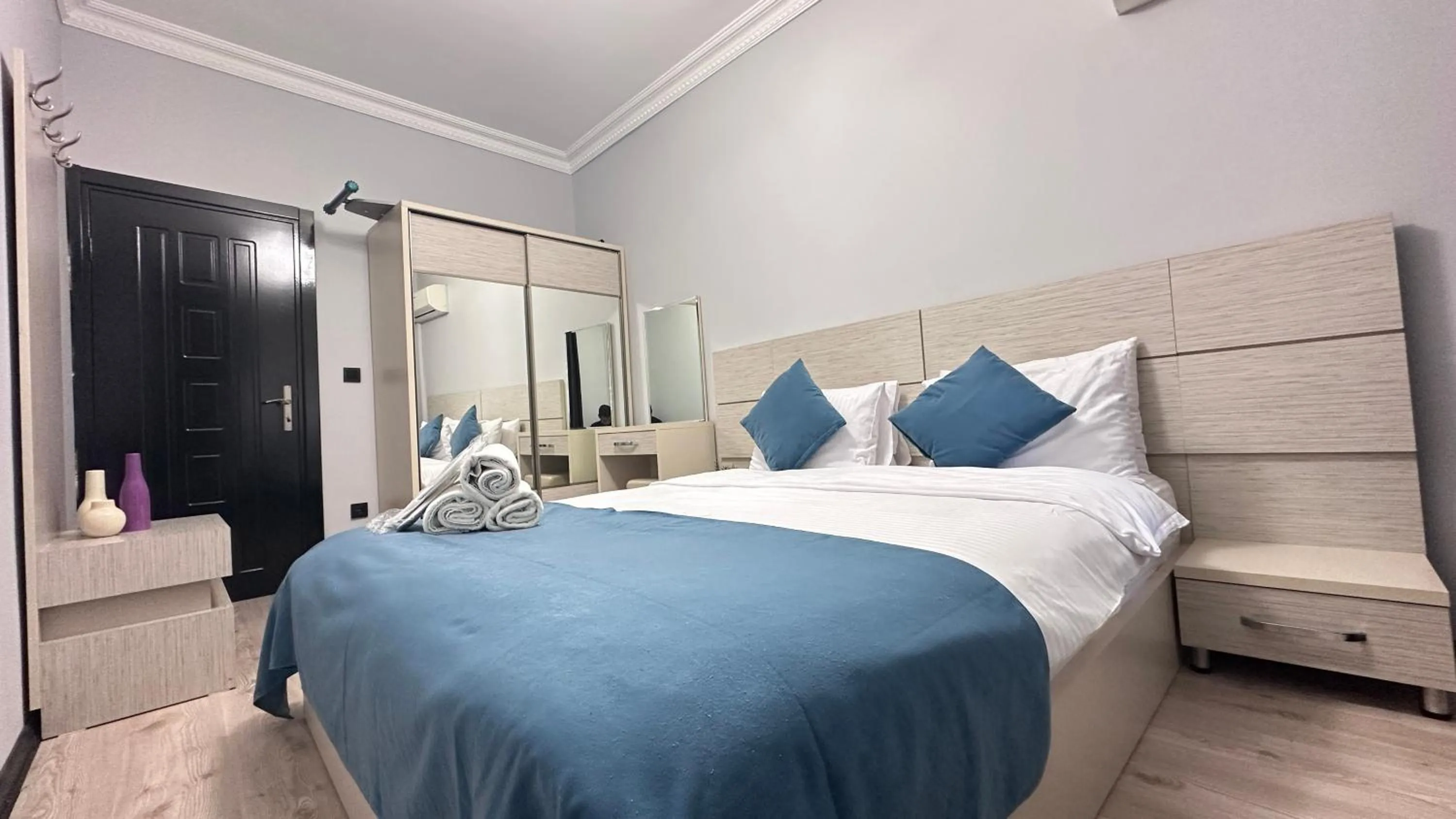 Bed in Overland Residence