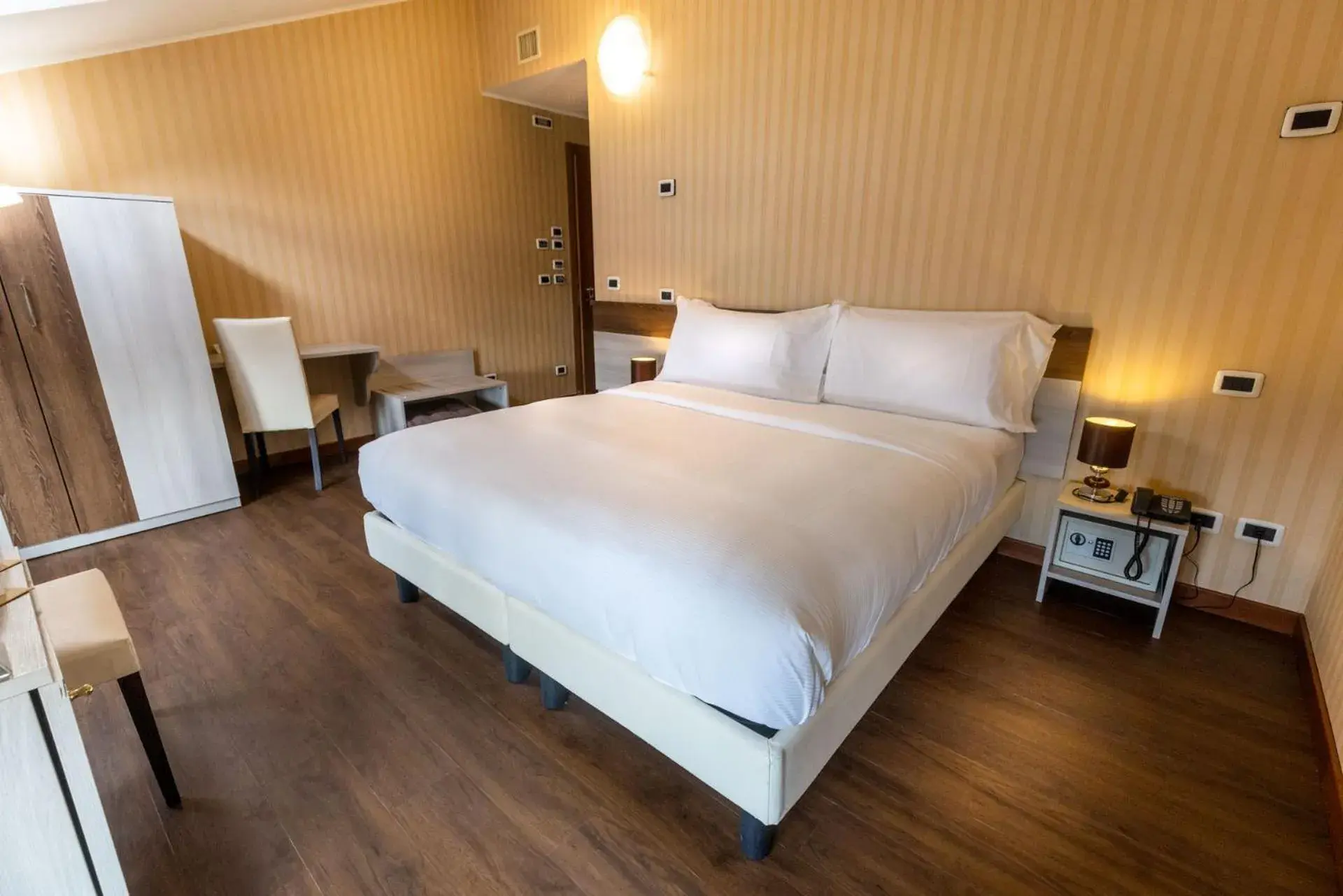 Bed in Mefuta Hotel