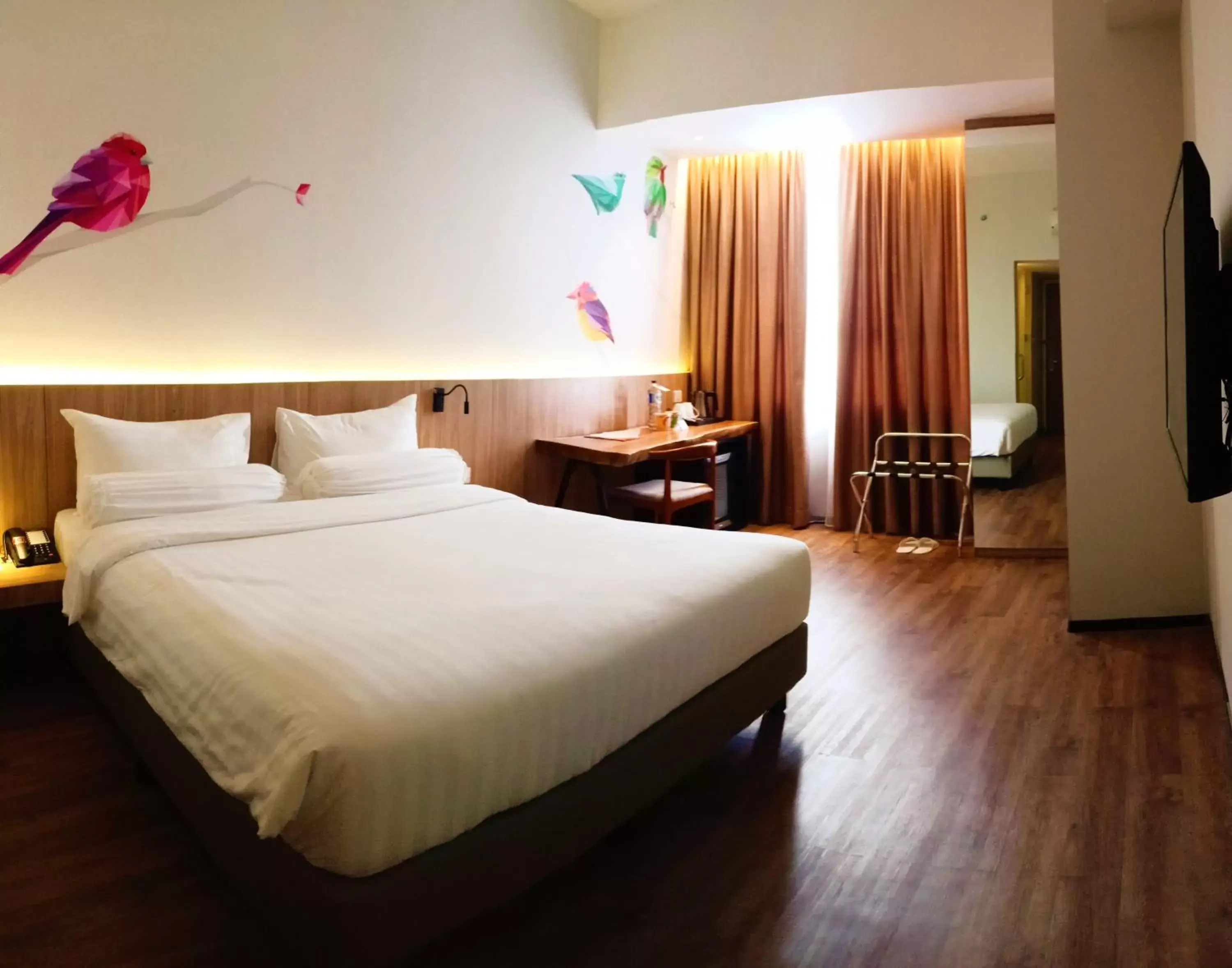 Bed in The Zuri Hotel Palembang