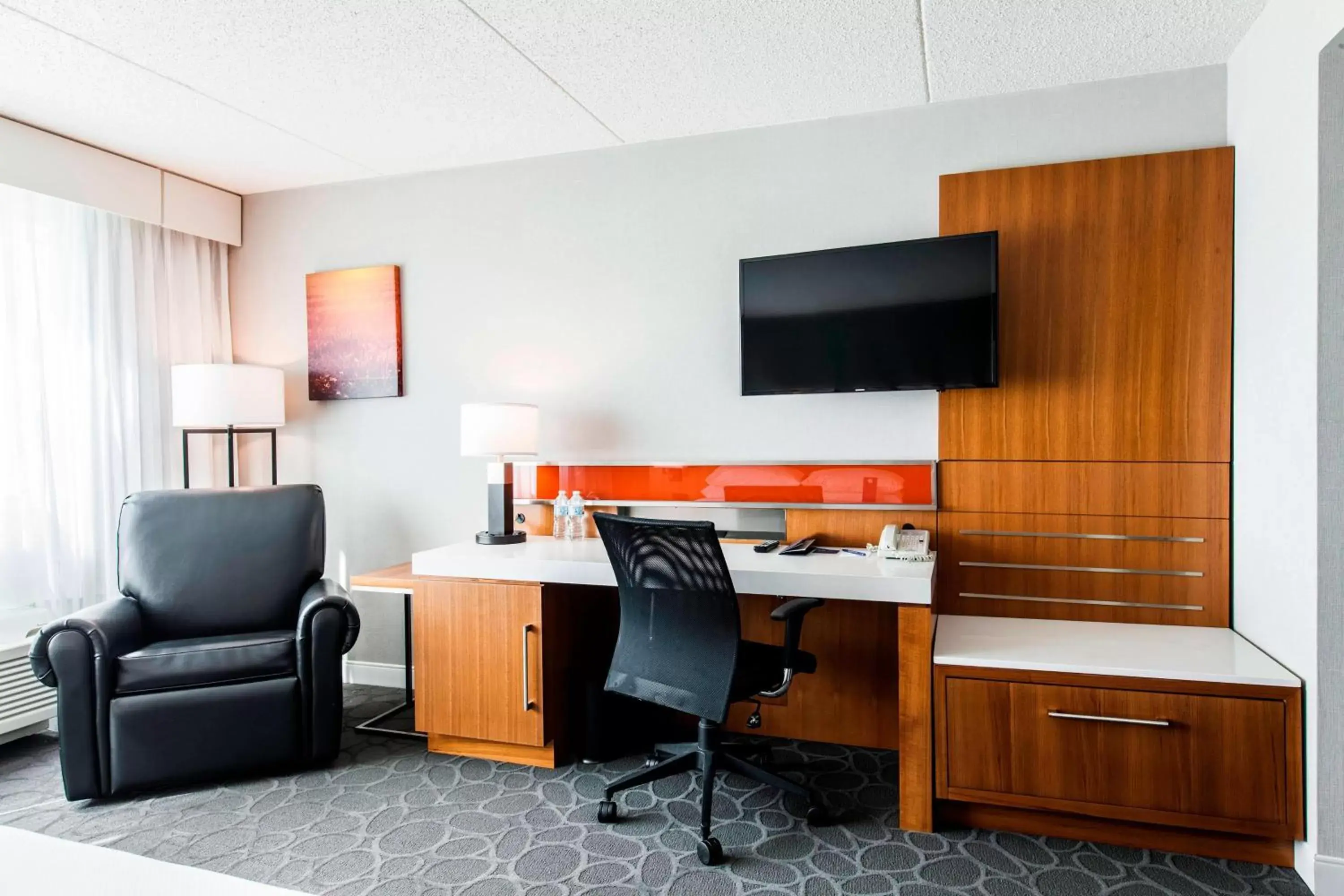 Photo of the whole room, TV/Entertainment Center in Delta Hotels by Marriott Fargo