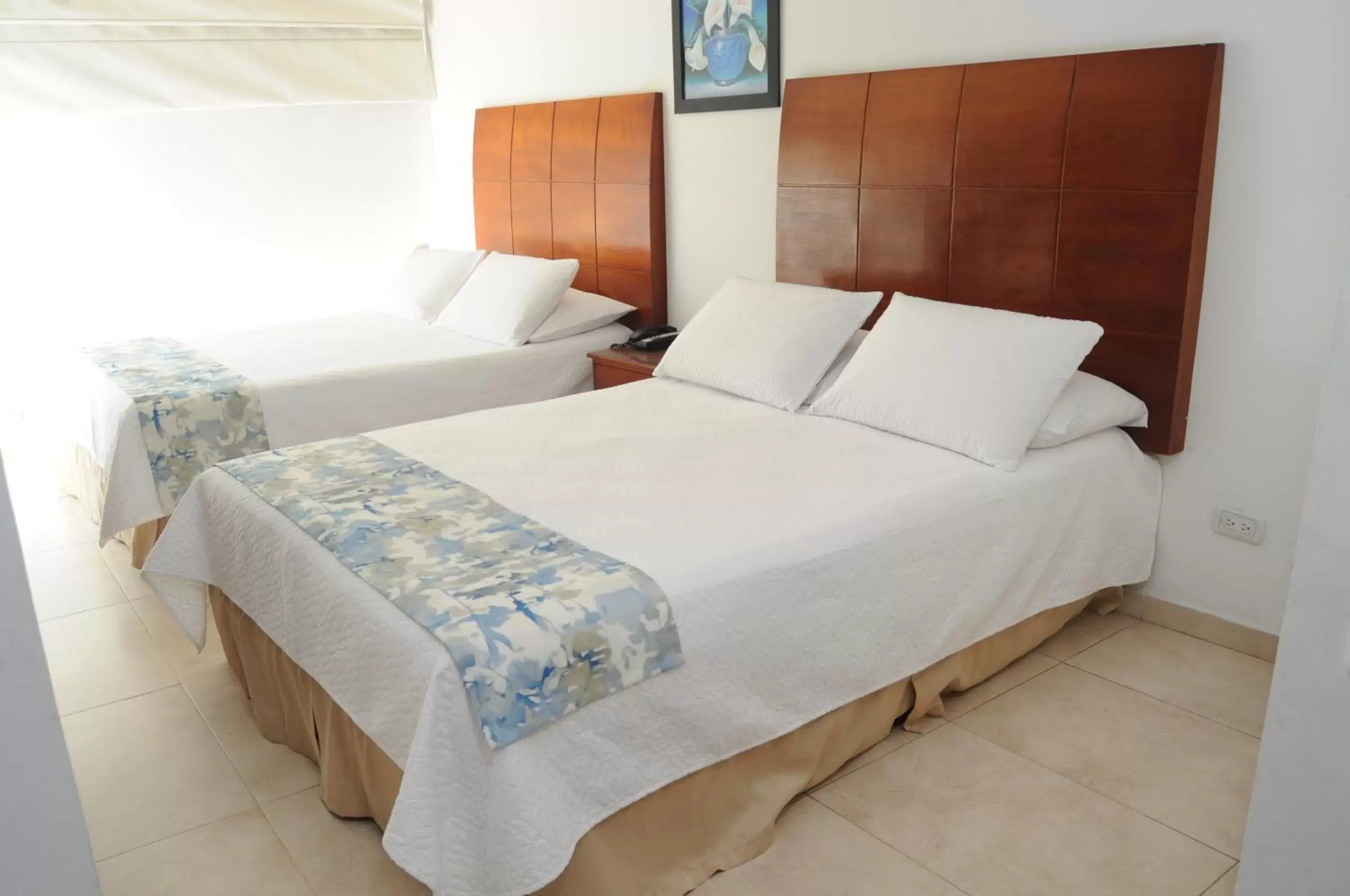 Property building, Bed in Coral Reef Hotel