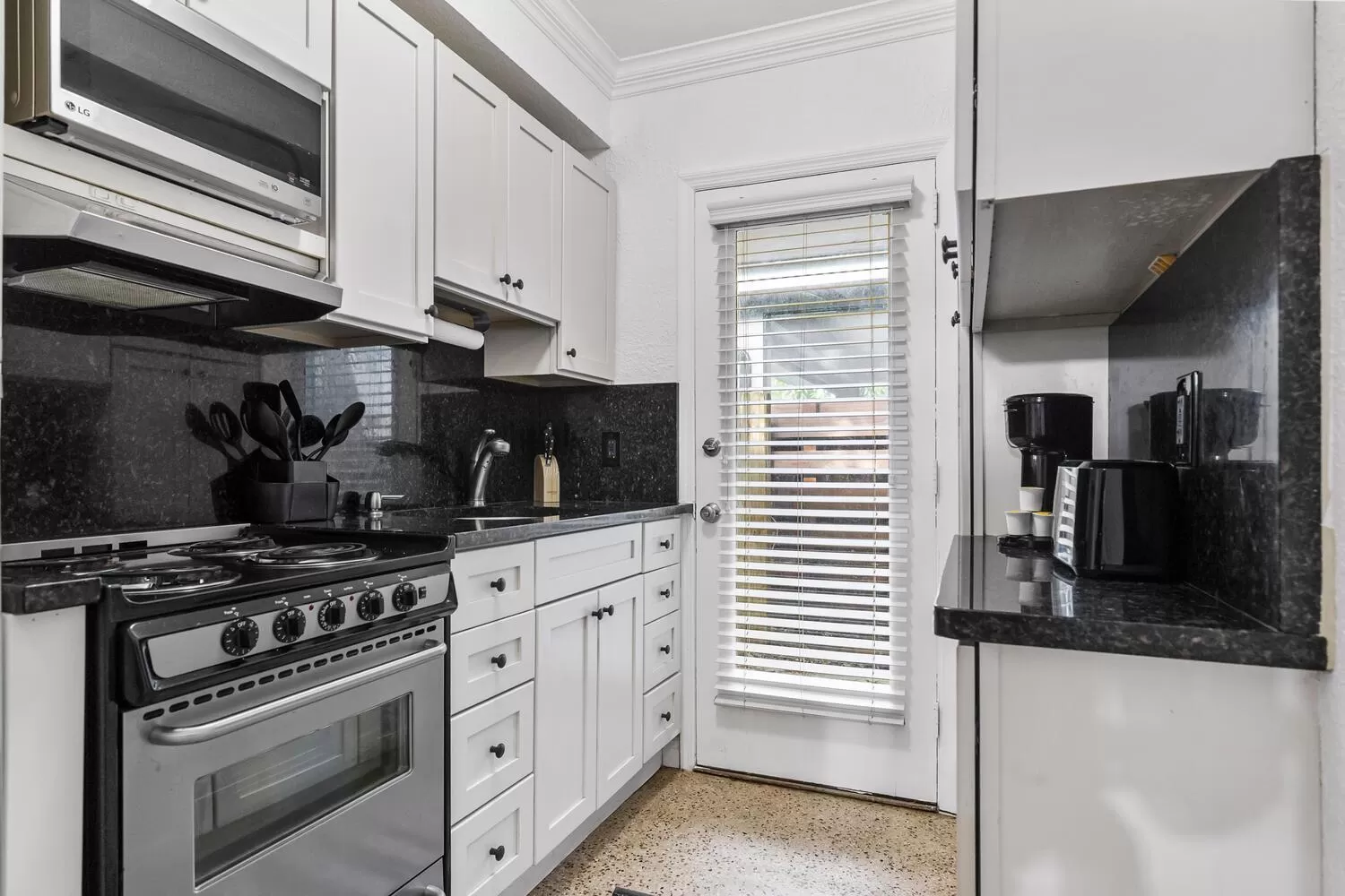 Kitchen or kitchenette in Alani Bay Villas