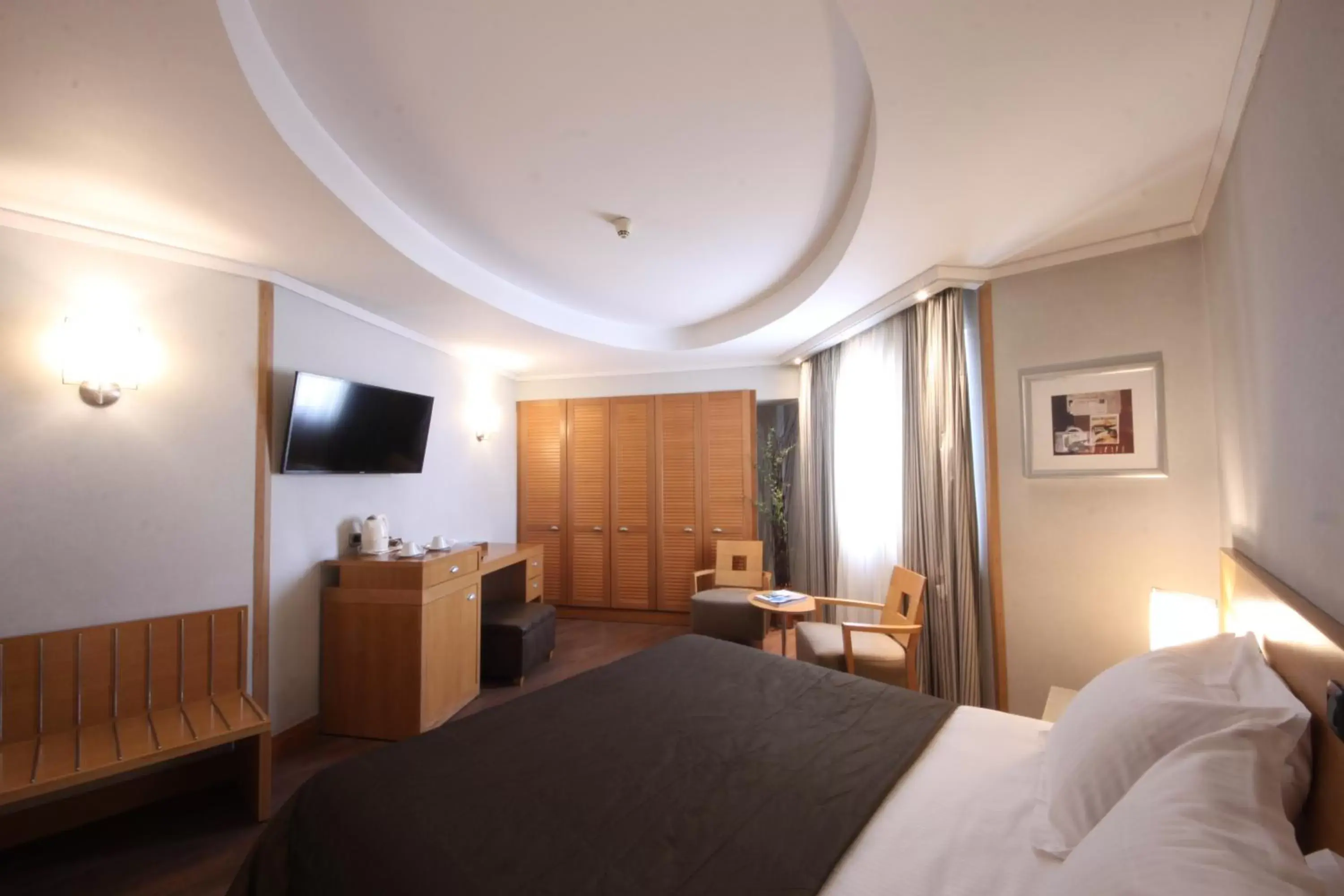 Bedroom in The Athenian Callirhoe Exclusive Hotel