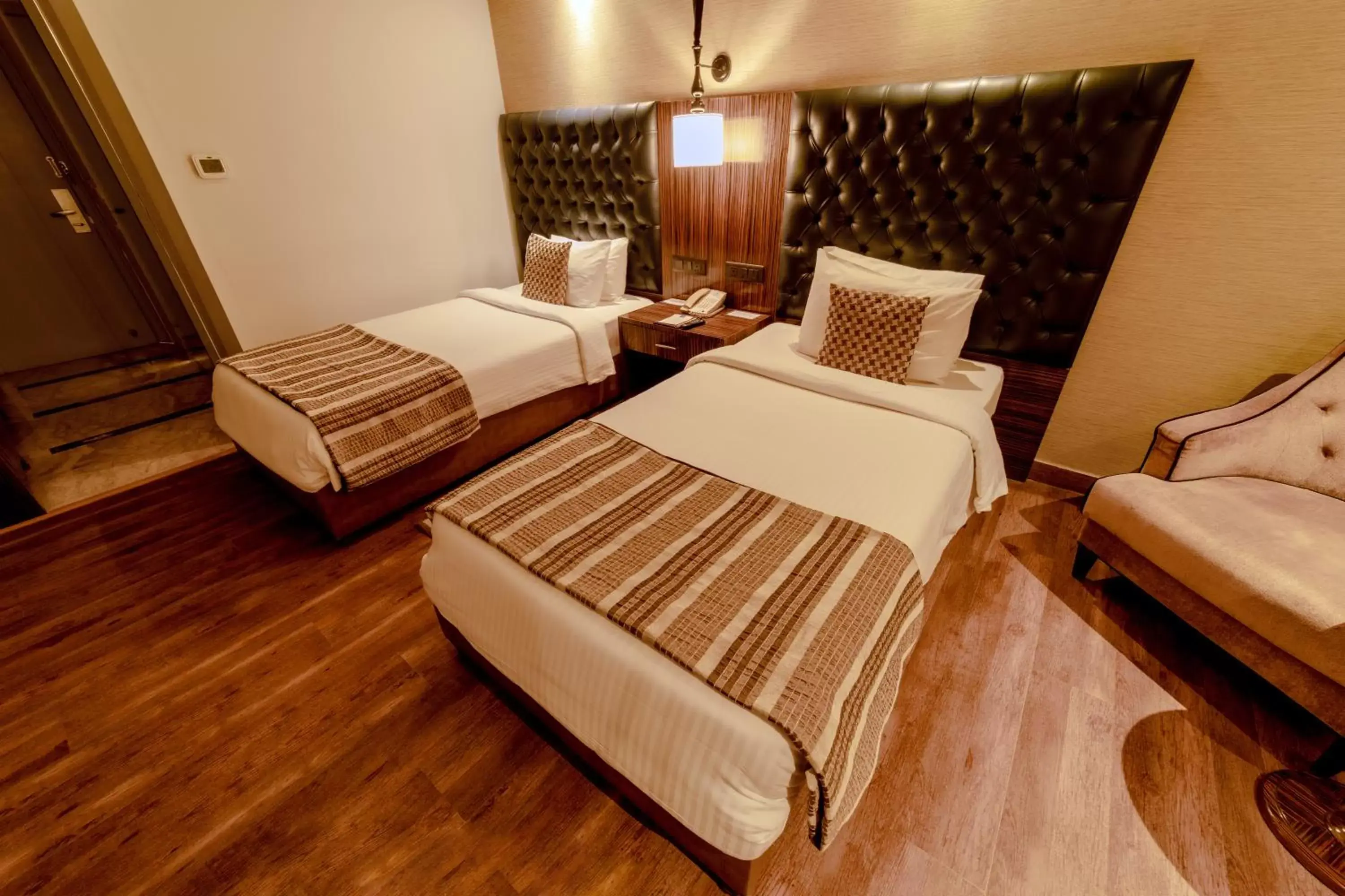 Bed in Sarovar Portico Jaipur