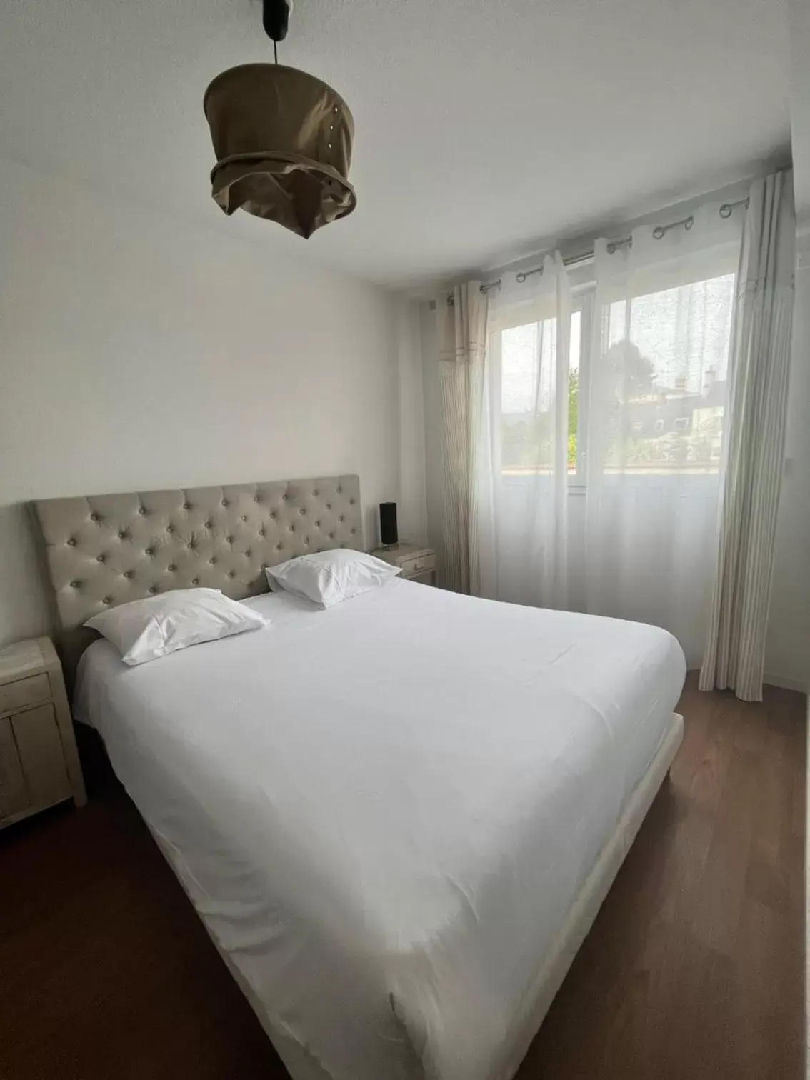 Bed in Zenao Appart'Hotel