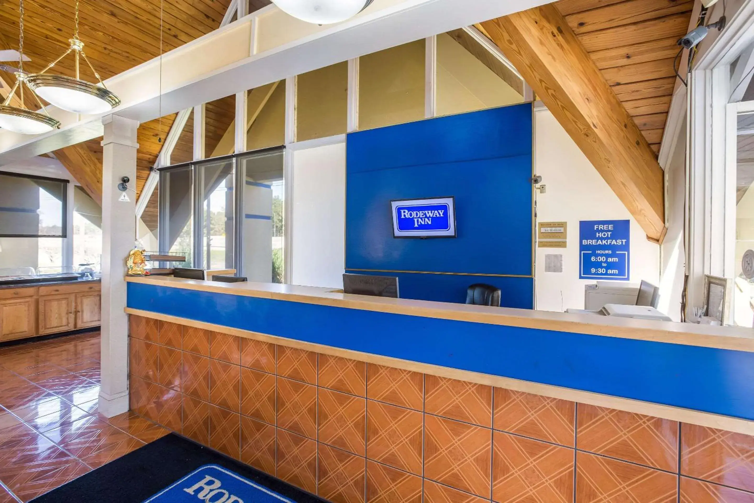 Lobby or reception in Super 8 by Wyndham Macon GA Lobby or reception in Super 8 by Wyndham Macon GA