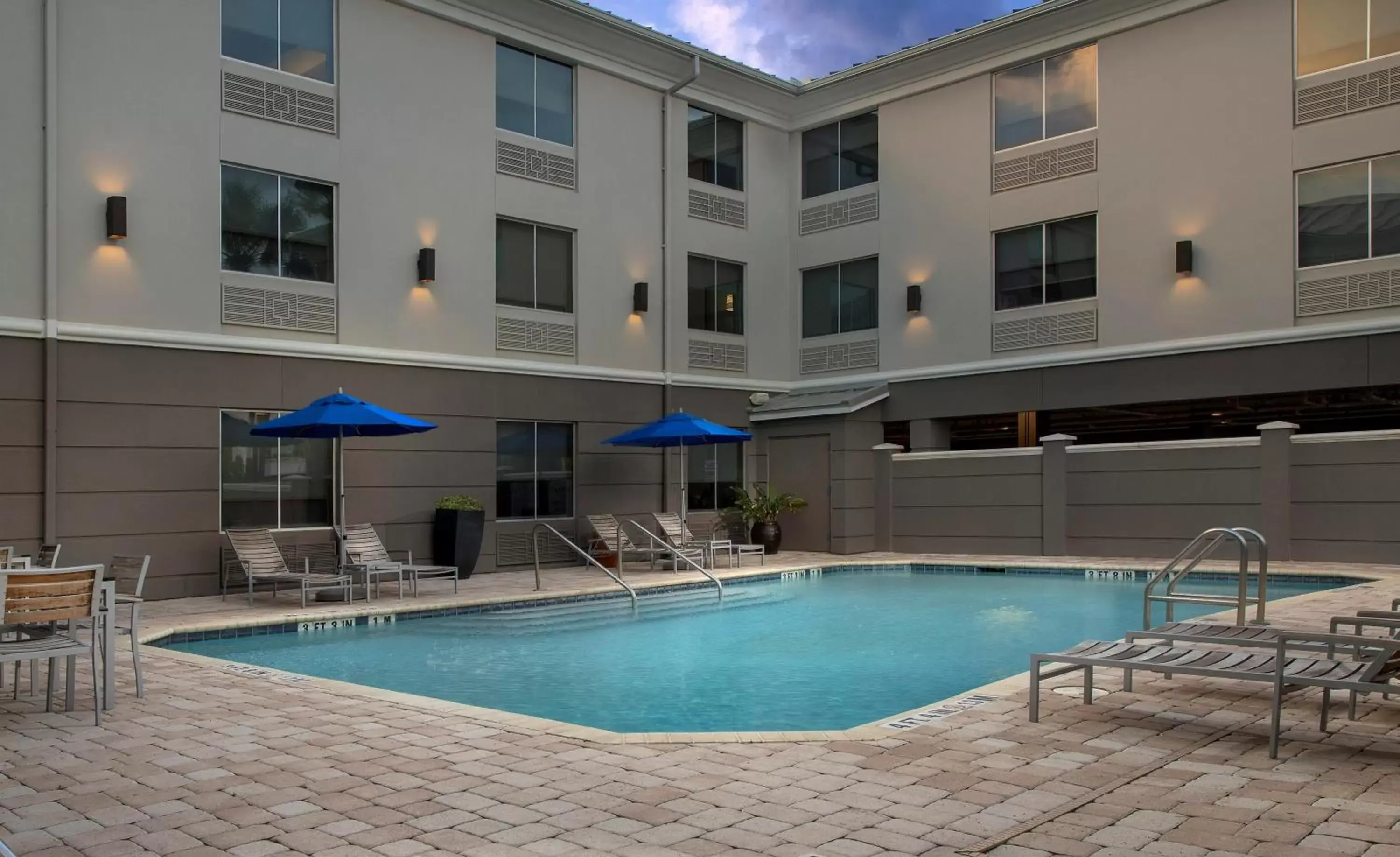 Swimming Pool in Holiday Inn Express Jacksonville Beach, an IHG Hotel