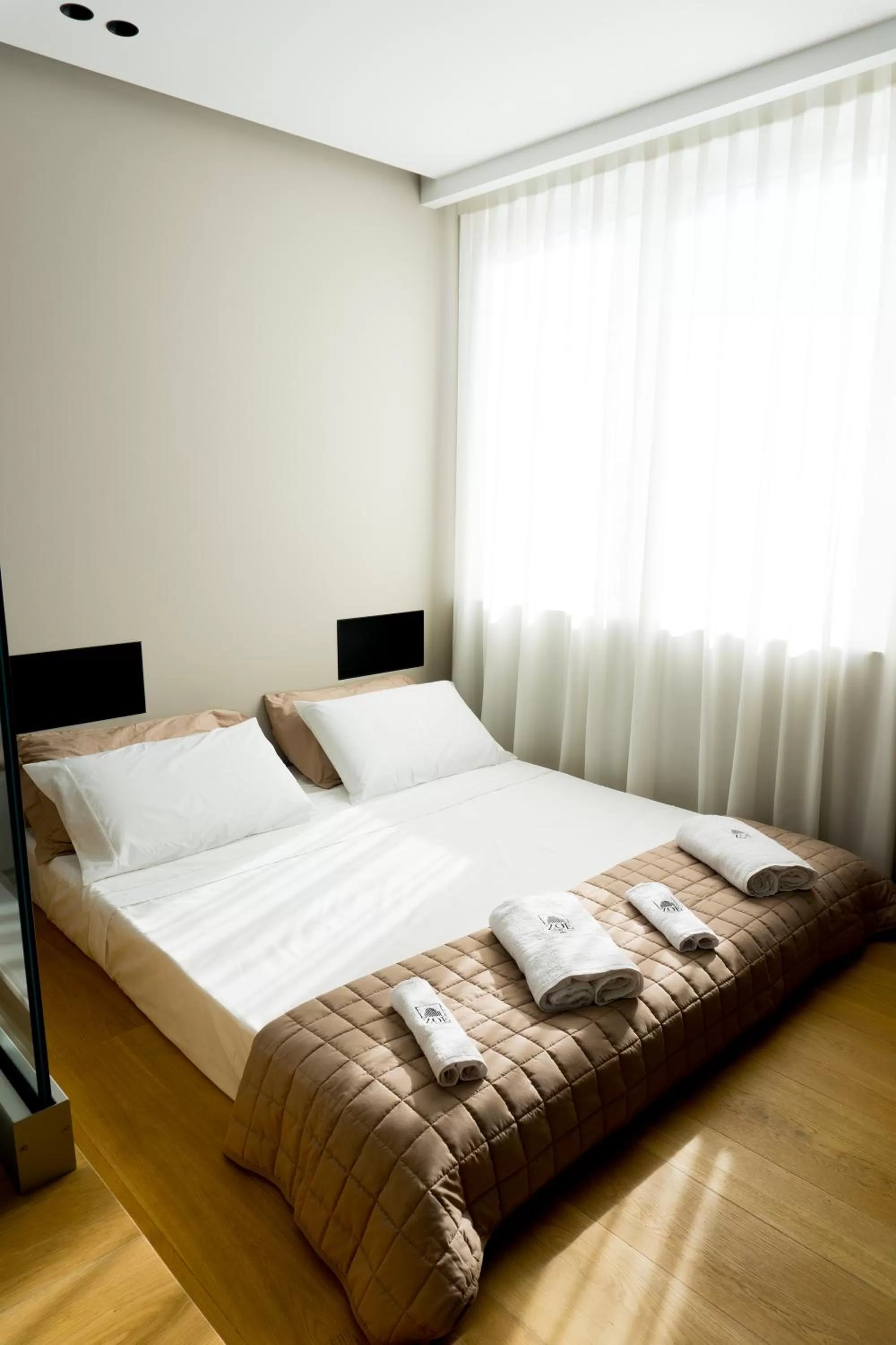 Bed in ZOE LUXURY SUITES