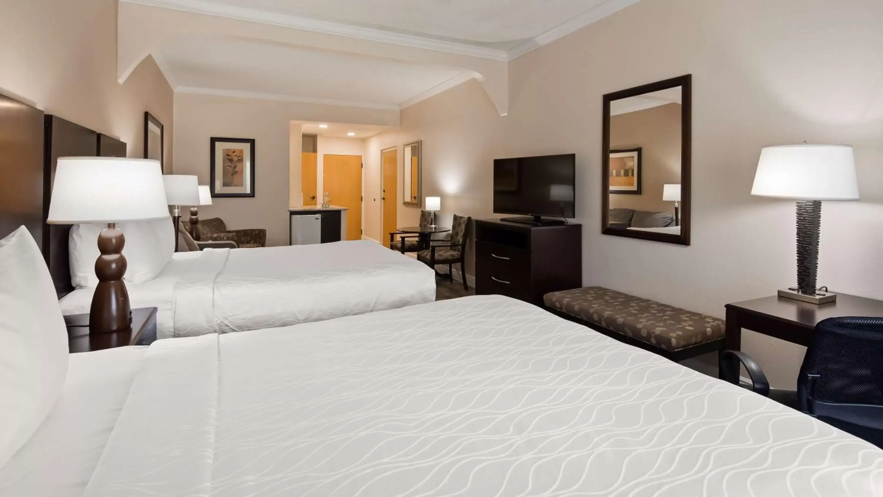 Bed in Best Western Plus Ambassador Suites
