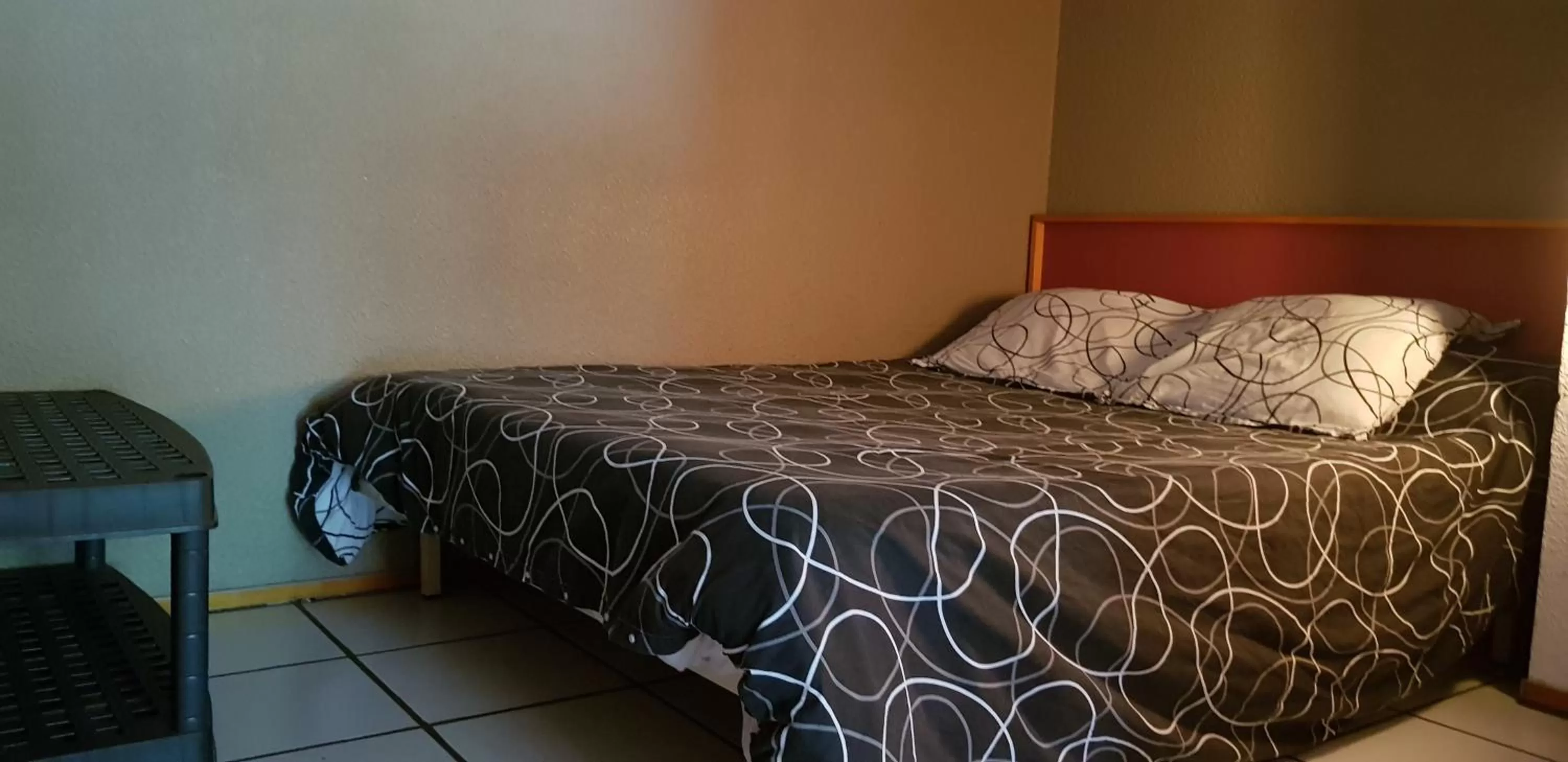 Bed in Hôtel Eco Logis Espace Bellevue