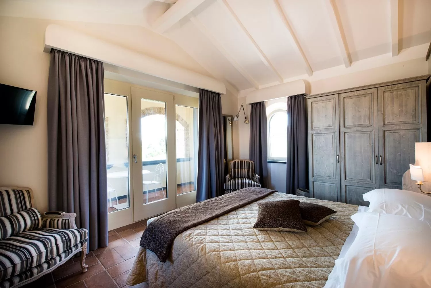 Photo of the whole room, Bed in Altarocca Wine Resort Adults Only