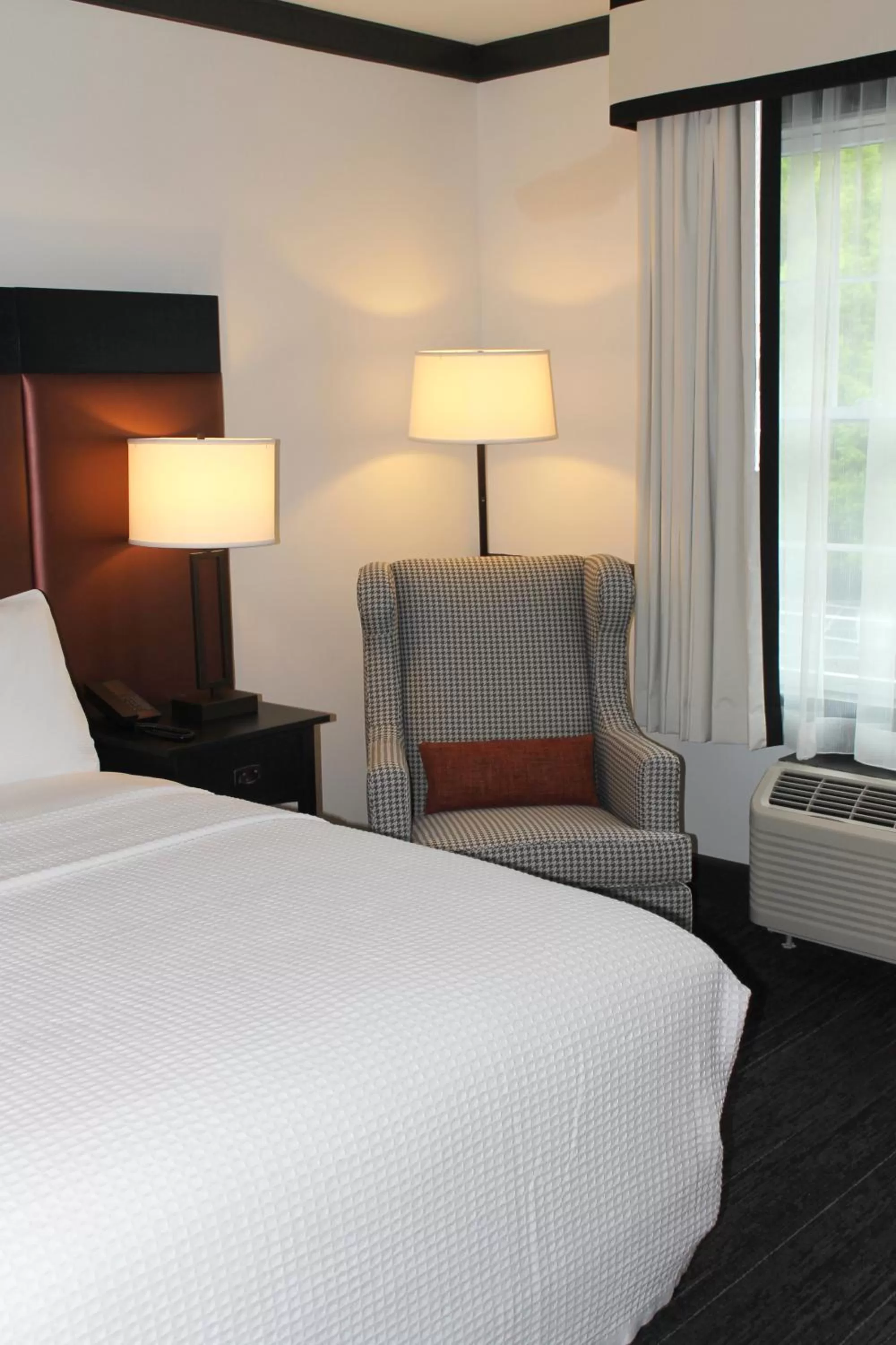 Bed in The Craftsman Inn & Suites