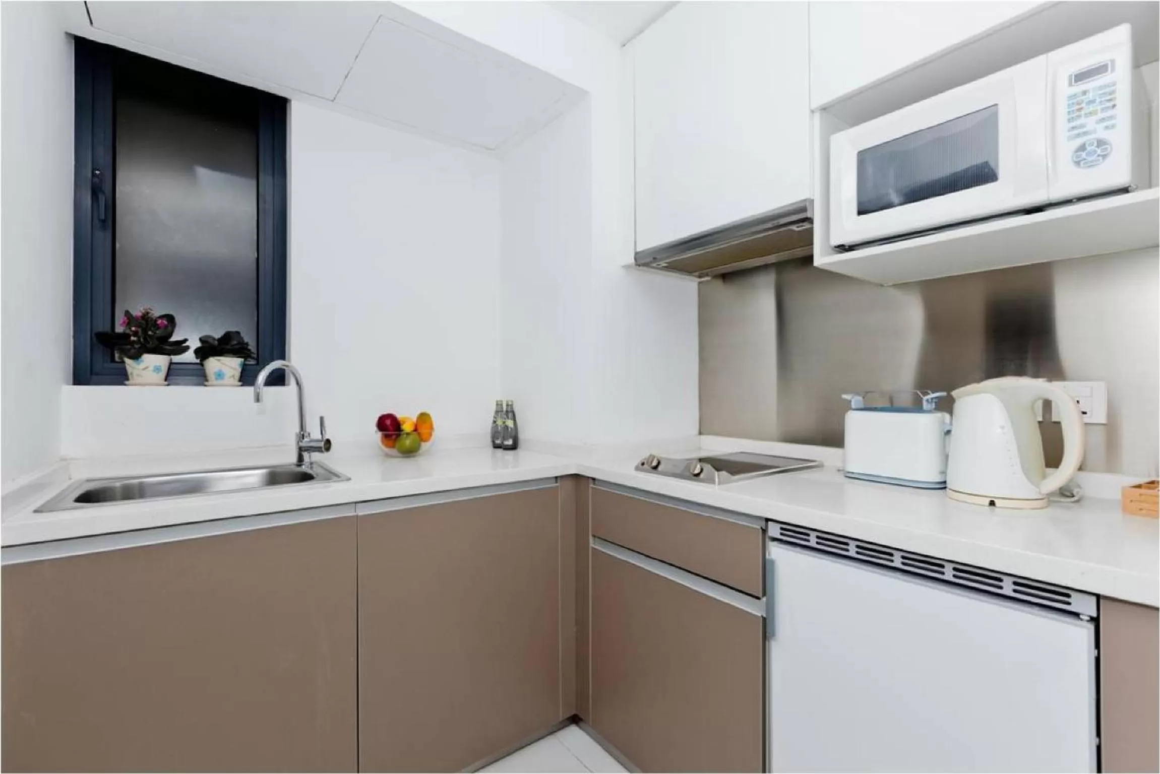 Kitchen or kitchenette in Citadines Xinghai Suzhou