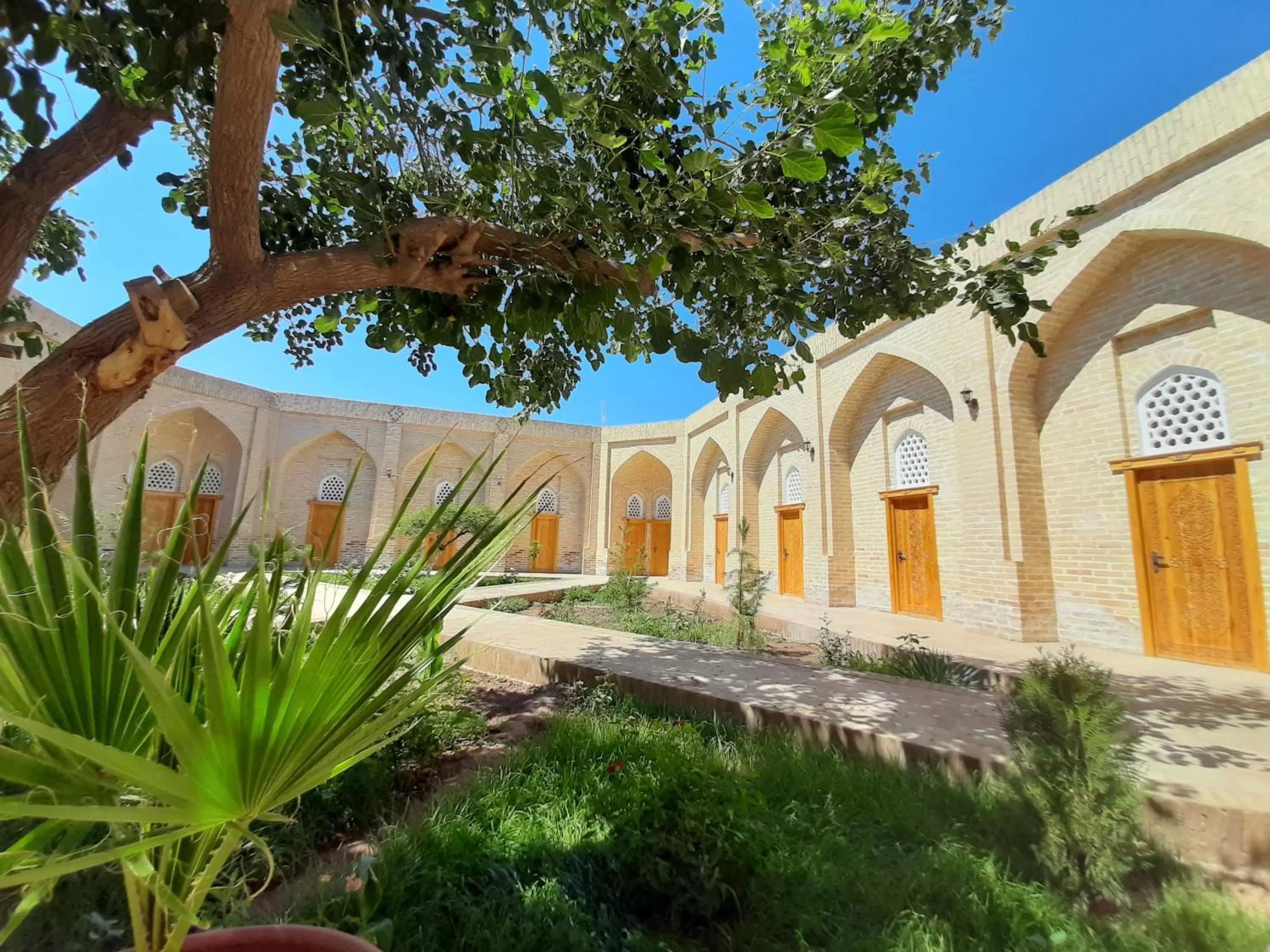 Property building in madrasah Polvon-Qori boutique hotel XIX century