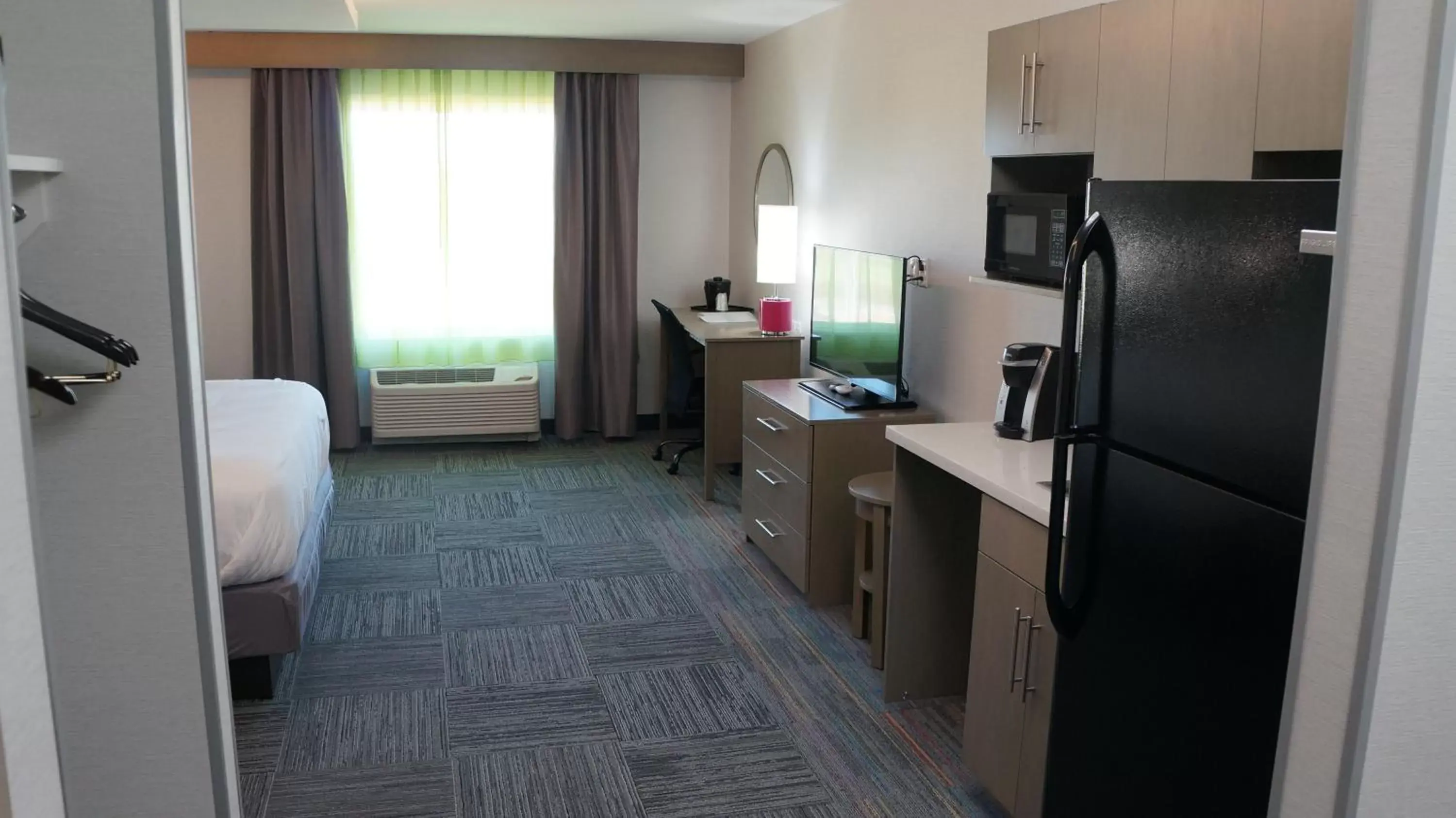 Photo of the whole room, TV/Entertainment Center in Holiday Inn Express & Suites Shippensburg, an IHG Hotel