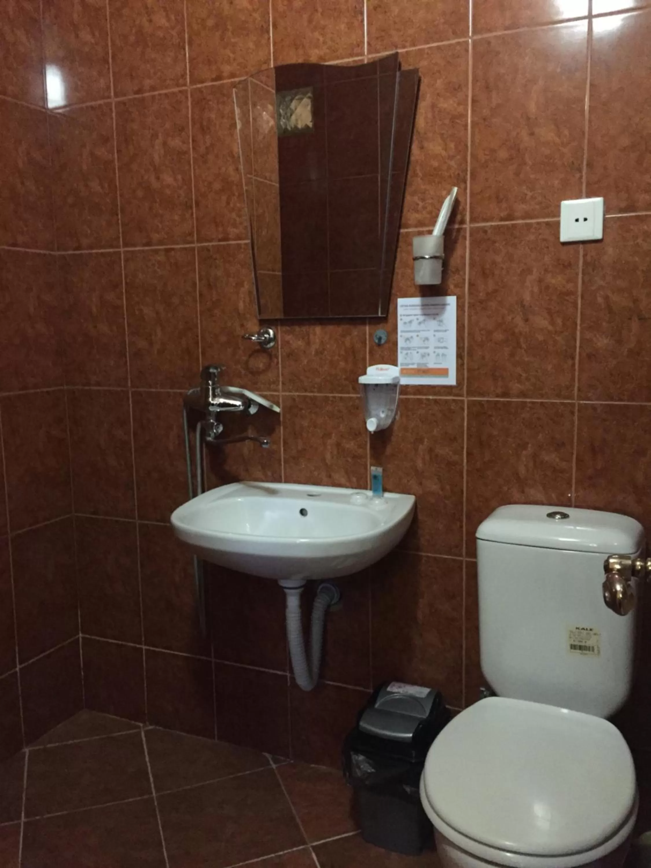 Bathroom in Piano Hotel