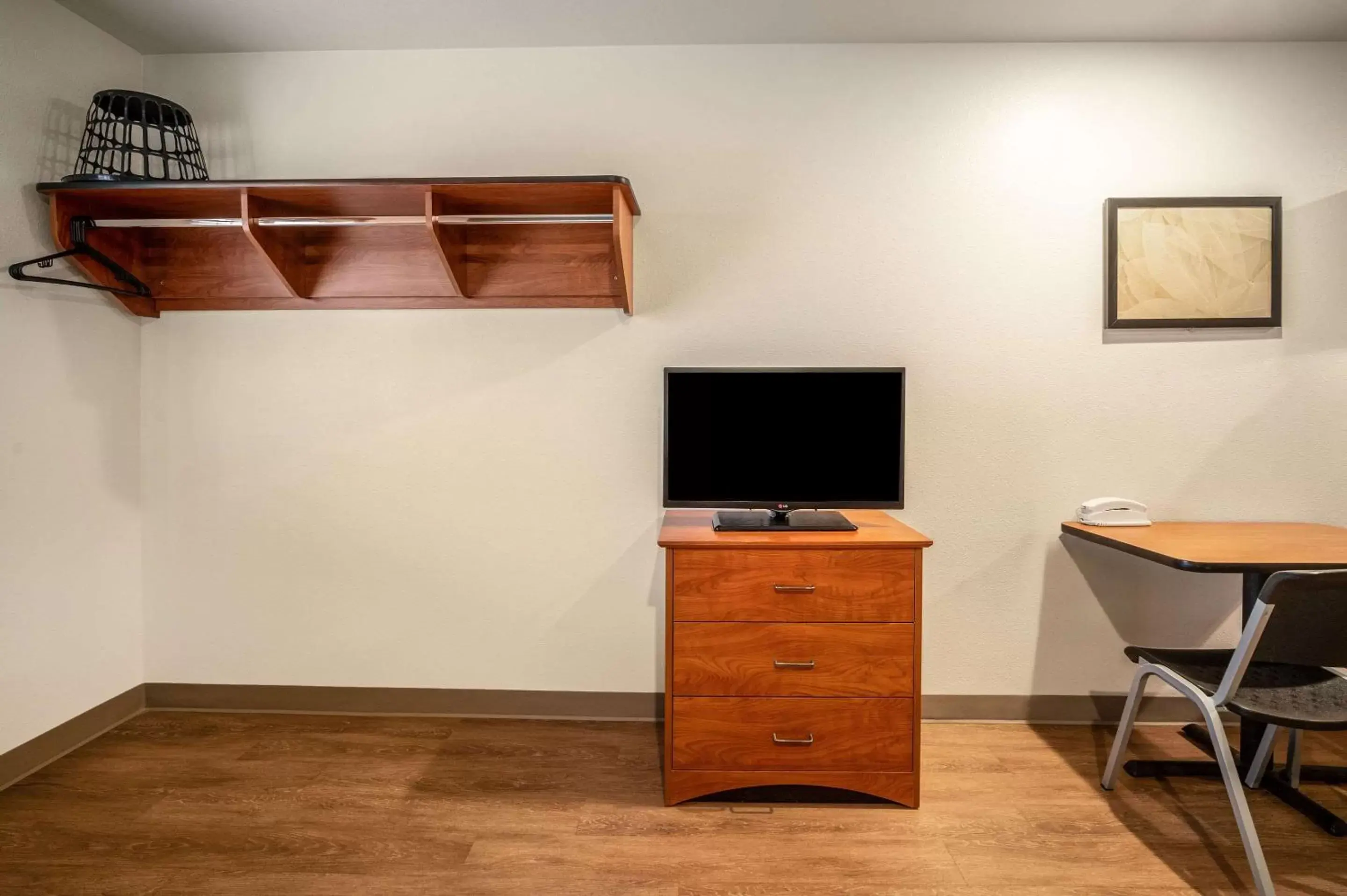 Photo of the whole room, TV/Entertainment Center in WoodSpring Suites Corpus Christi