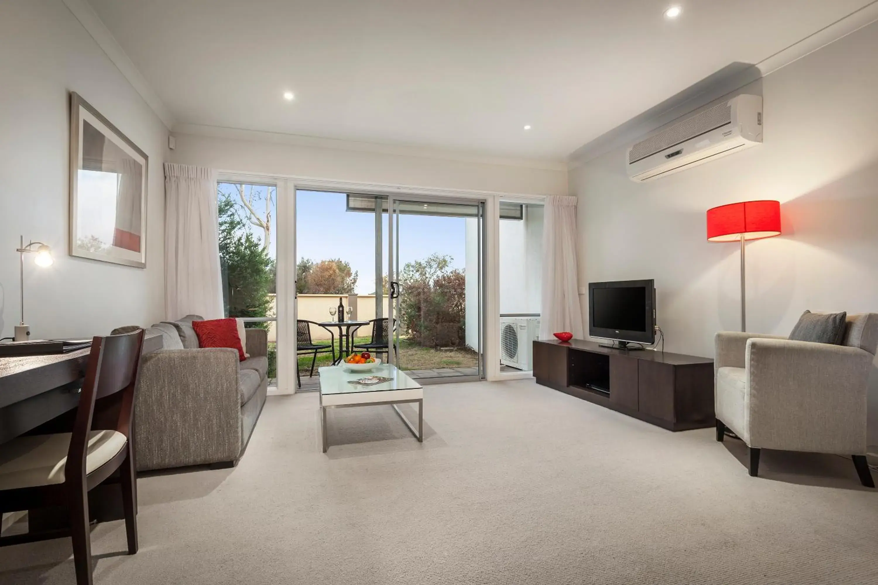 Living room, Seating Area in Quest Sanctuary Lakes Apartments